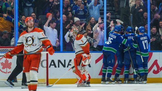 Jan 29, 2026; Vancouver, British Columbia, CAN; The Vancouver Canucks celebrate their first goal in the third period against Anaheim Ducks at Rogers Arena. 
