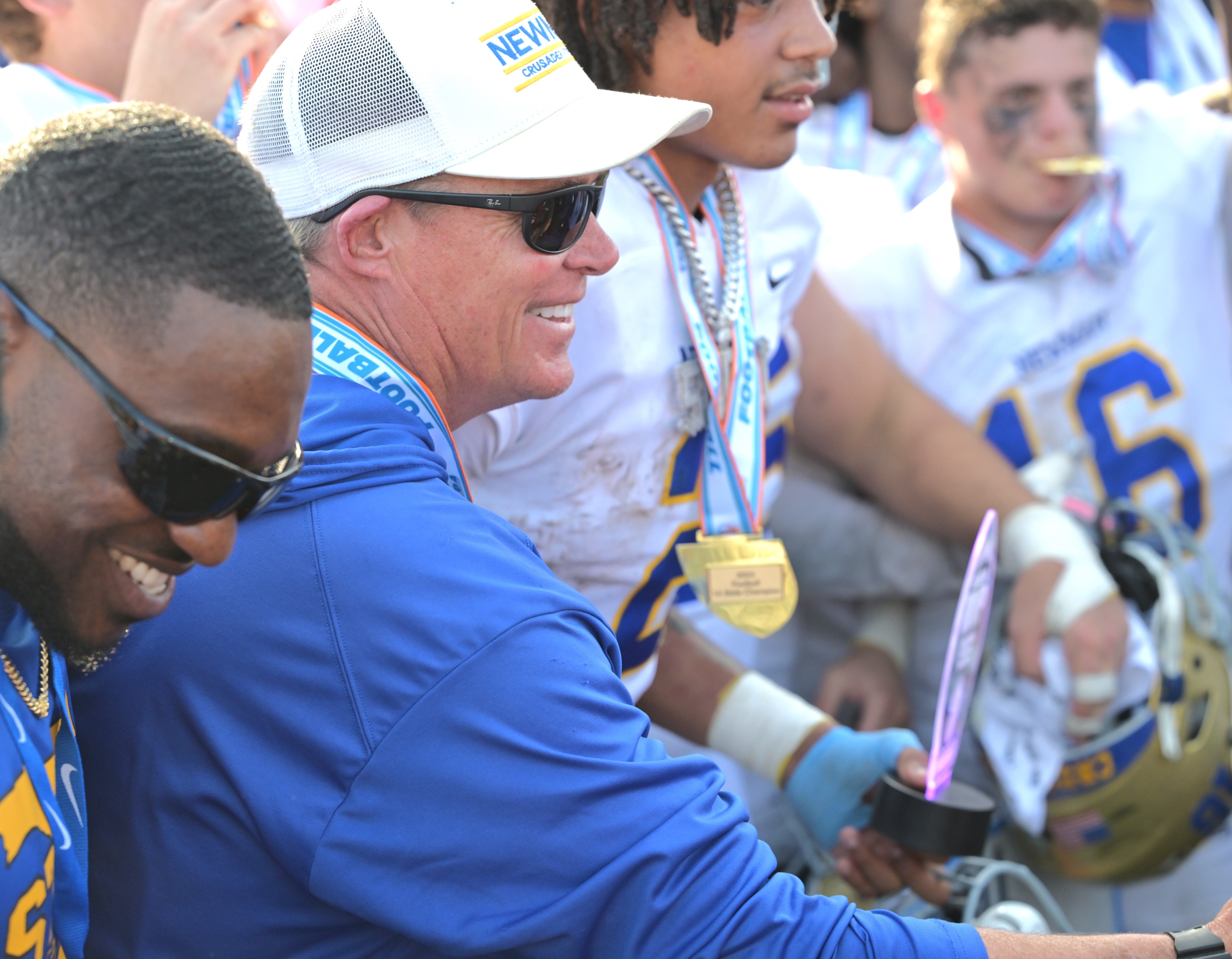 Cardinal Newman's Jack Daniels is all smiles following the Crusaders' state championship victory over Chaminade Madonna on Dec. 11, 2025.