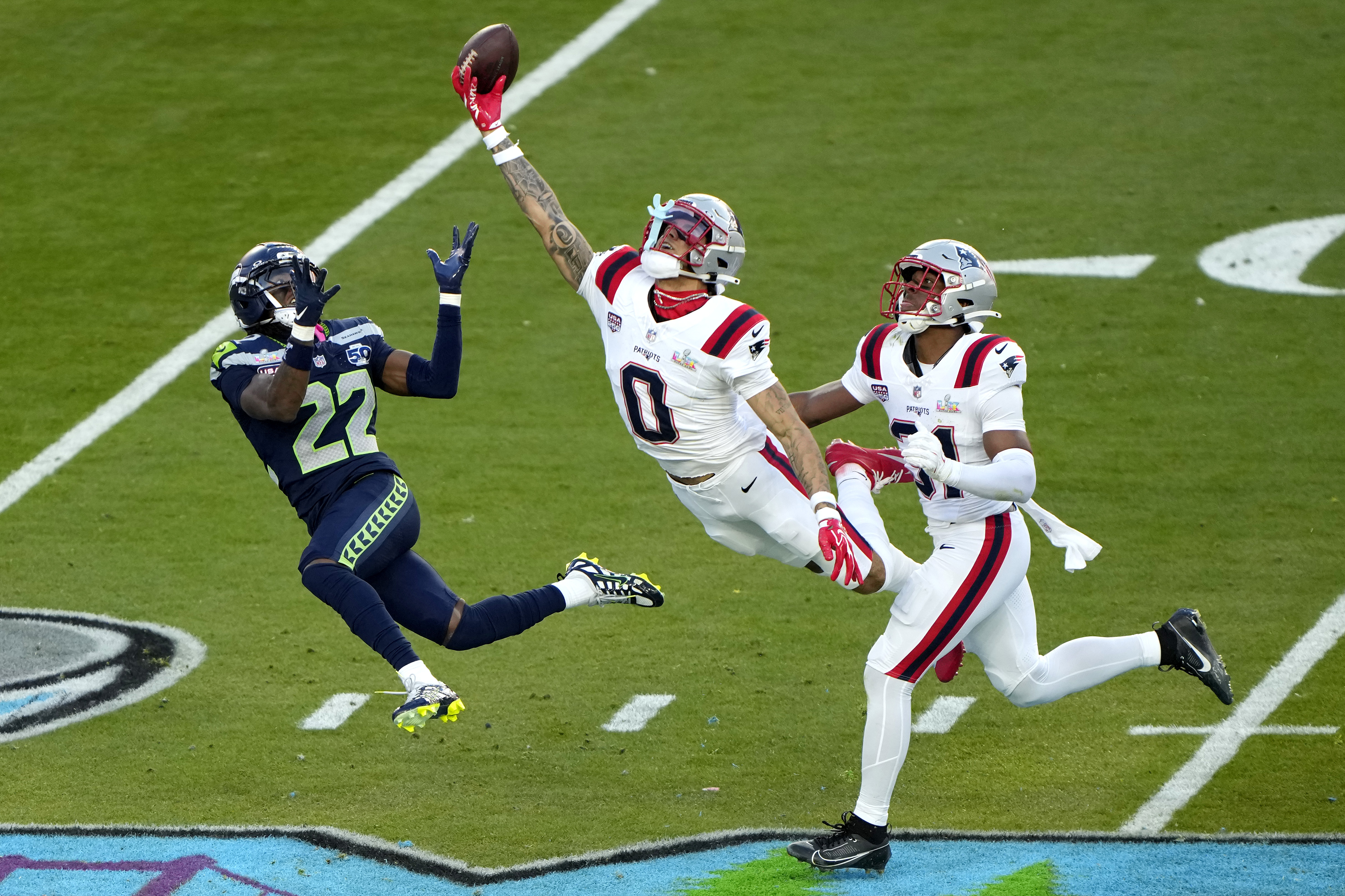 SANTA CLARA, CALIFORNIA - FEBRUARY 08: Christian Gonzalez #0 of the New England Patriots breaks up a pass intended for for Rashid Shaheed #22 of the Seattle Seahawks during the second quarter in Super Bowl LX at Levi's Stadium on February 08, 2026 in Santa Clara, California. (Photo by Thearon W. Henderson/Getty Images)