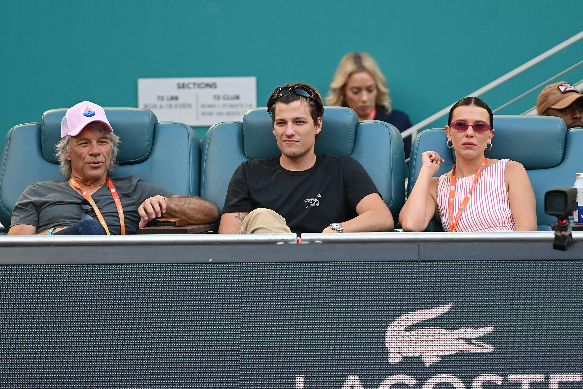 Millie Bobby Brown and husband Jake Bongiovi spotted at the Miami Open with Jon Bon Jovi.