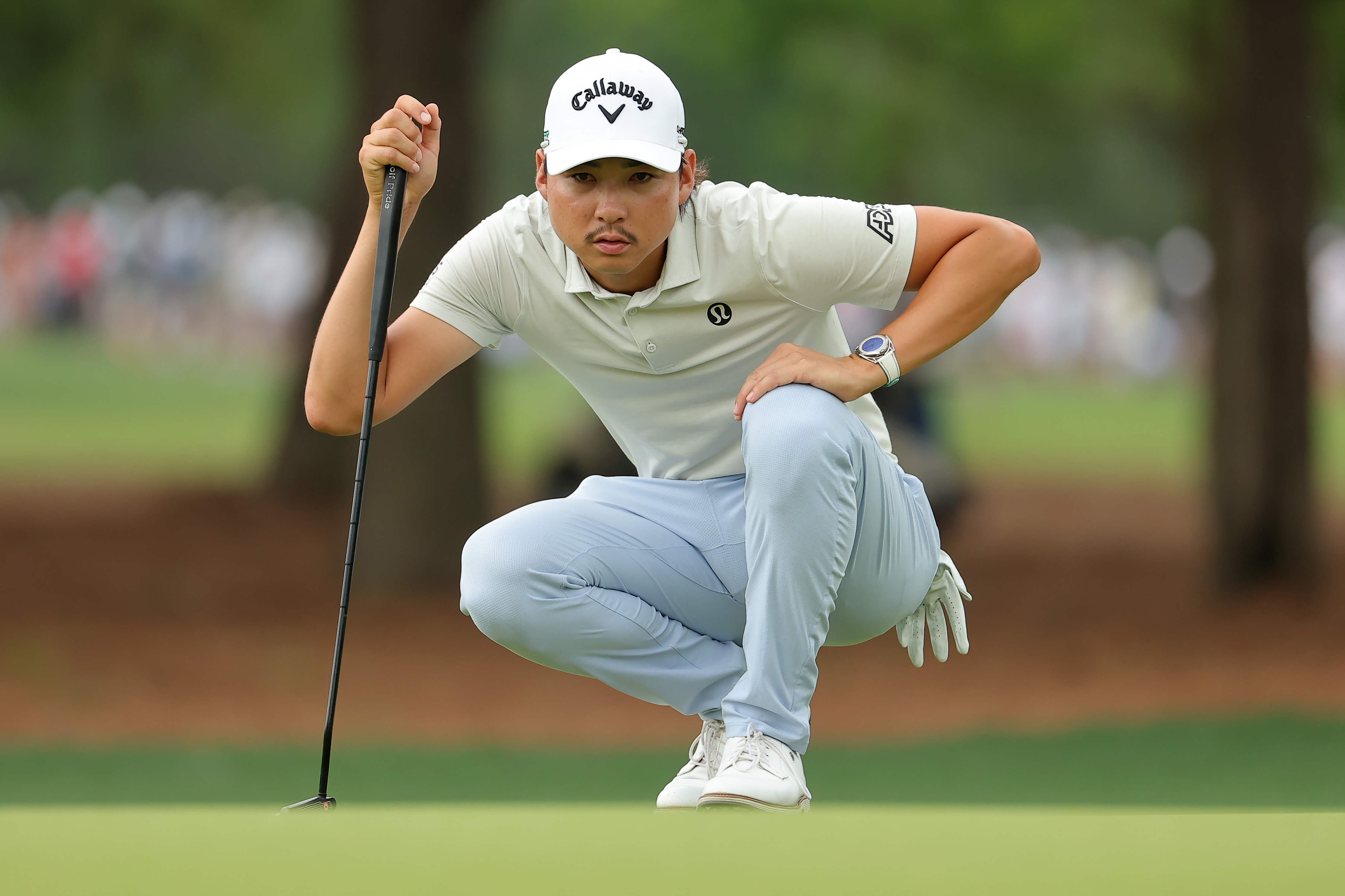 HOUSTON, TEXAS - MARCH 30: Min Woo Lee of Australia lines up his putt on the fifth hole during the final round of the Texas Children's Houston Open 2025 at Memorial Park Golf Course on March 30, 2025 in Houston, Texas. (Photo by Jonathan Bachman/Getty Images)