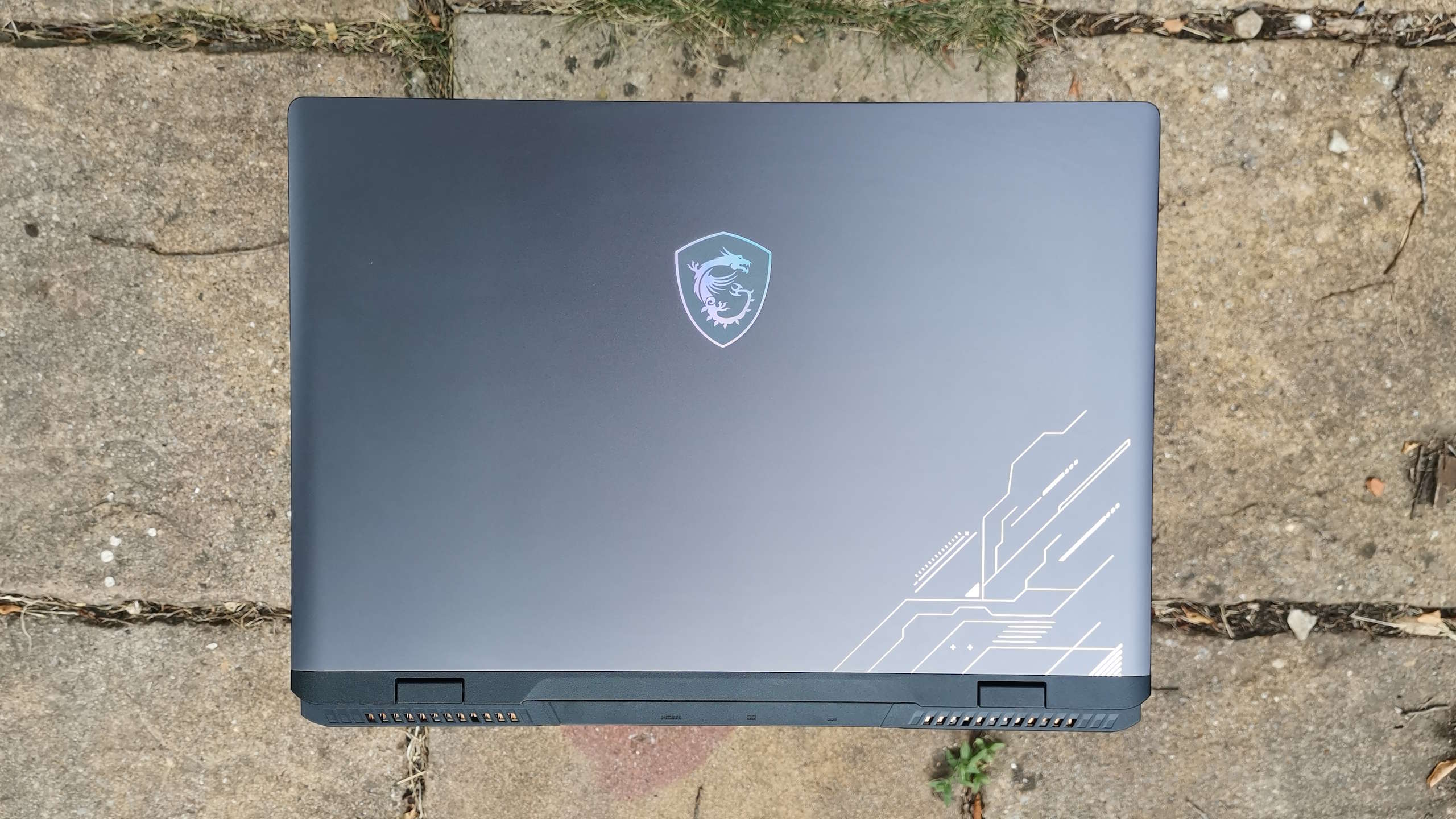 An MSI gaming laptop outdoors.