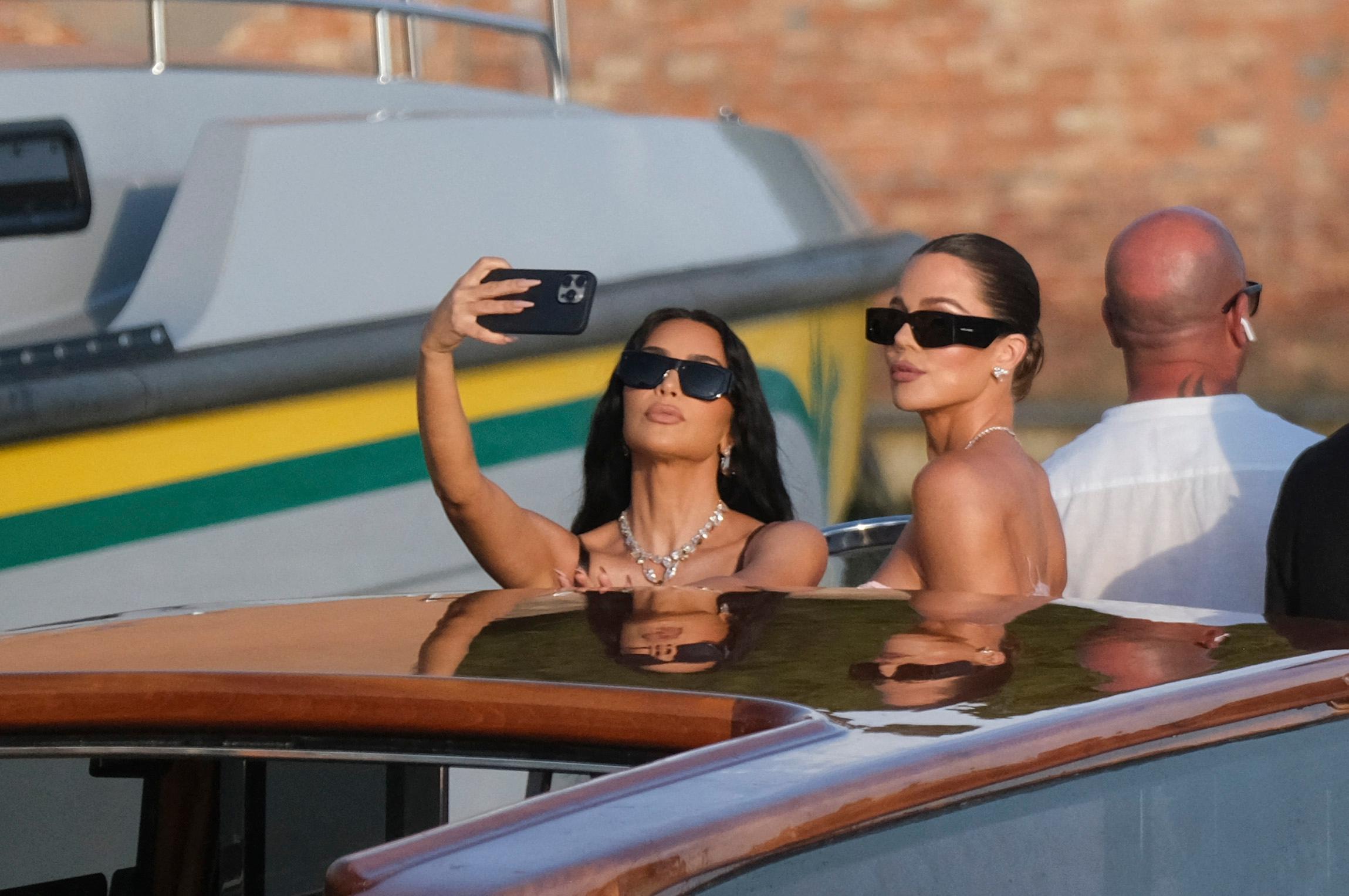 Kim and Khlo&egrave; Kardashian heading to Bezos' wedding in Venice.