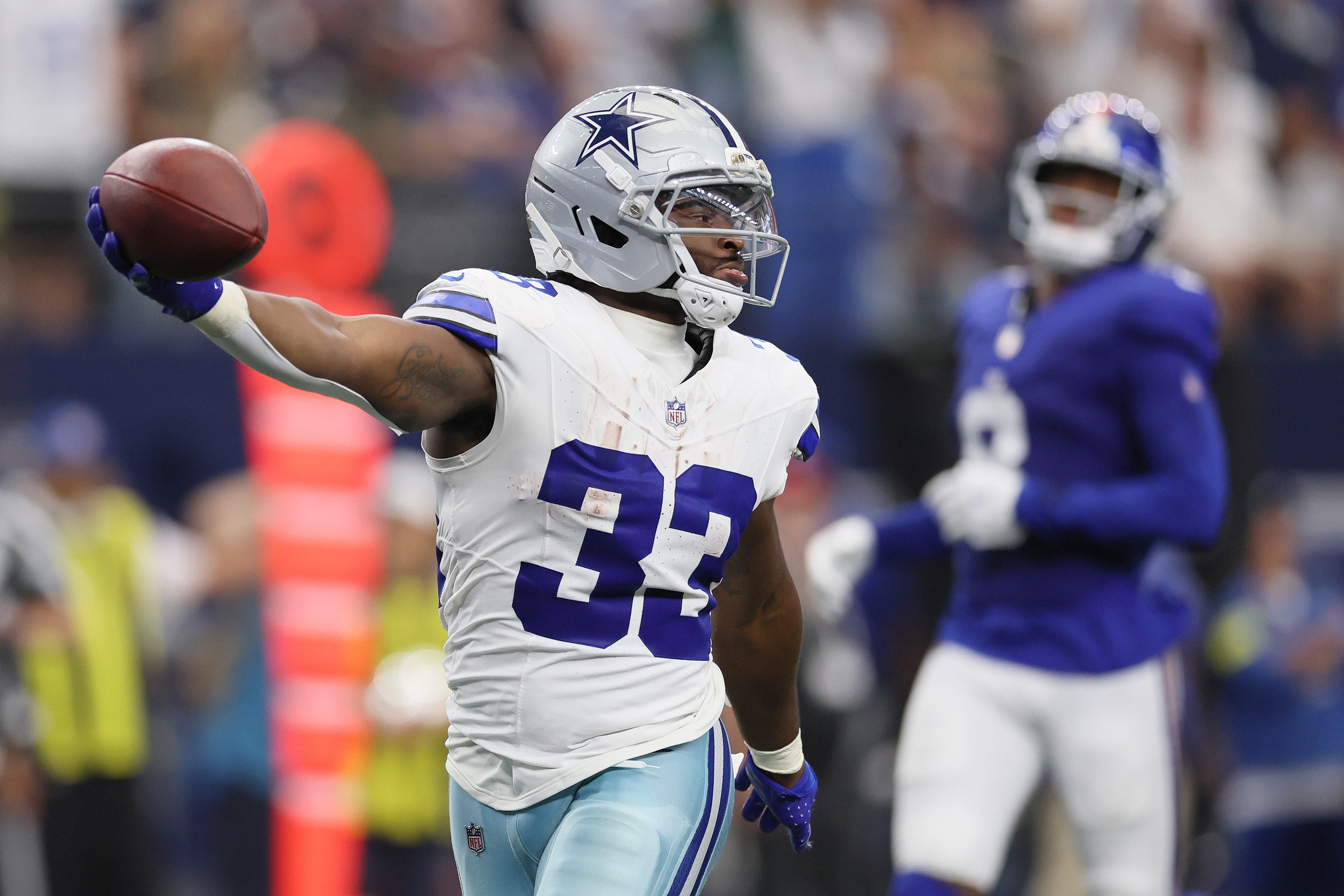ARLINGTON, TEXAS - SEPTEMBER 14: Javonte Williams #33 of the Dallas Cowboys runs for a touchdown during the third quarter of the game against the New York Giants at AT&T Stadium on September 14, 2025 in Arlington, Texas. (Photo by Sam Hodde/Getty Images)