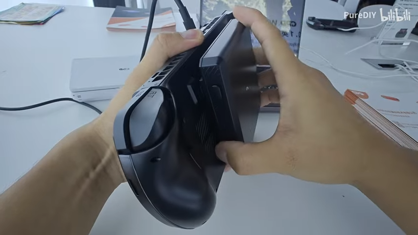 GPD Win 5 gaming handheld on a white table