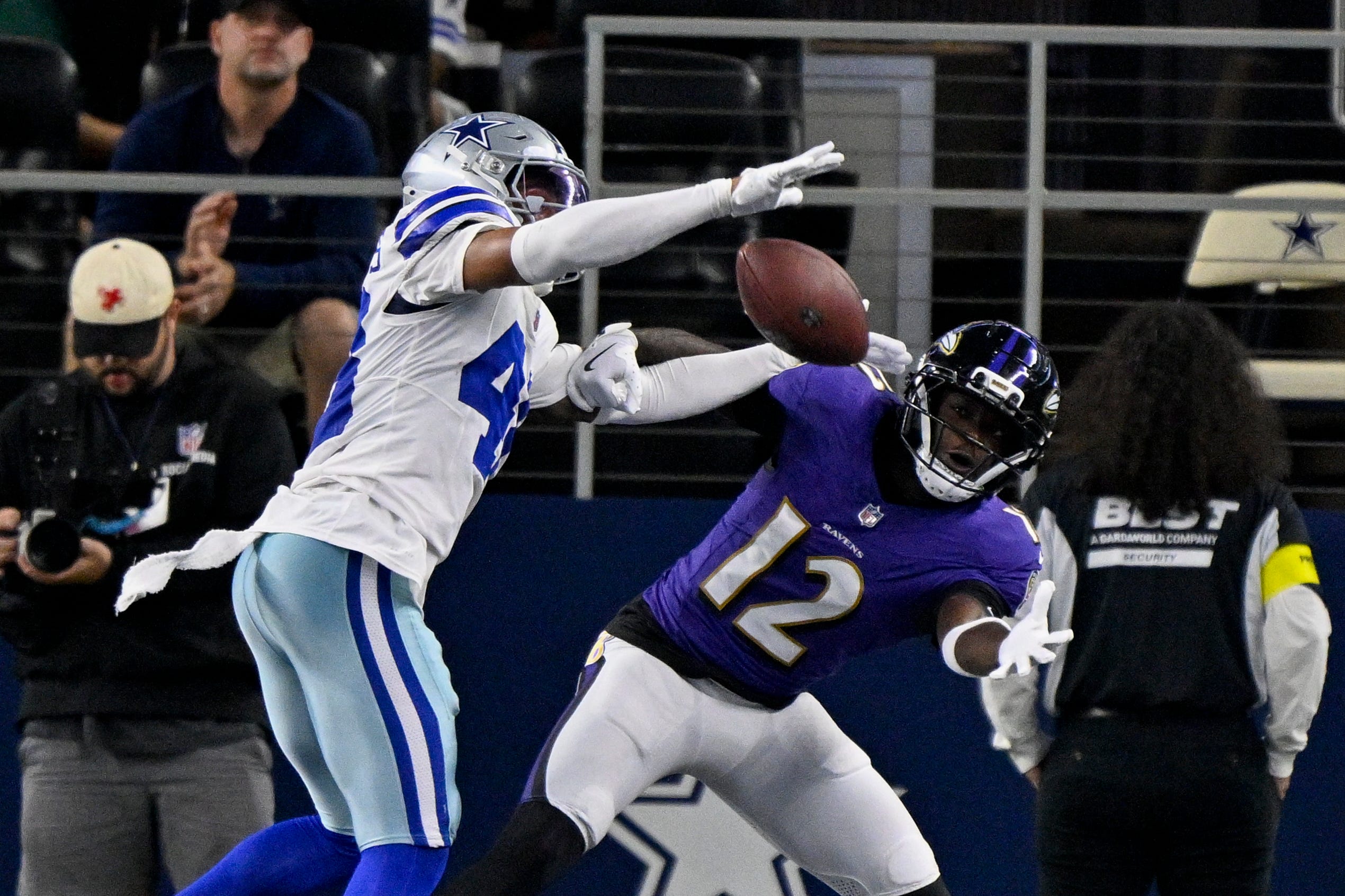 Aug 16, 2025; Arlington, Texas, USA; Dallas Cowboys cornerback Zion Childress (48) breaks up a pass intended for Baltimore Ravens wide receiver Malik Cunningham (12) during the second half at AT&T Stadium. Mandatory Credit: Jerome Miron-Imagn Images