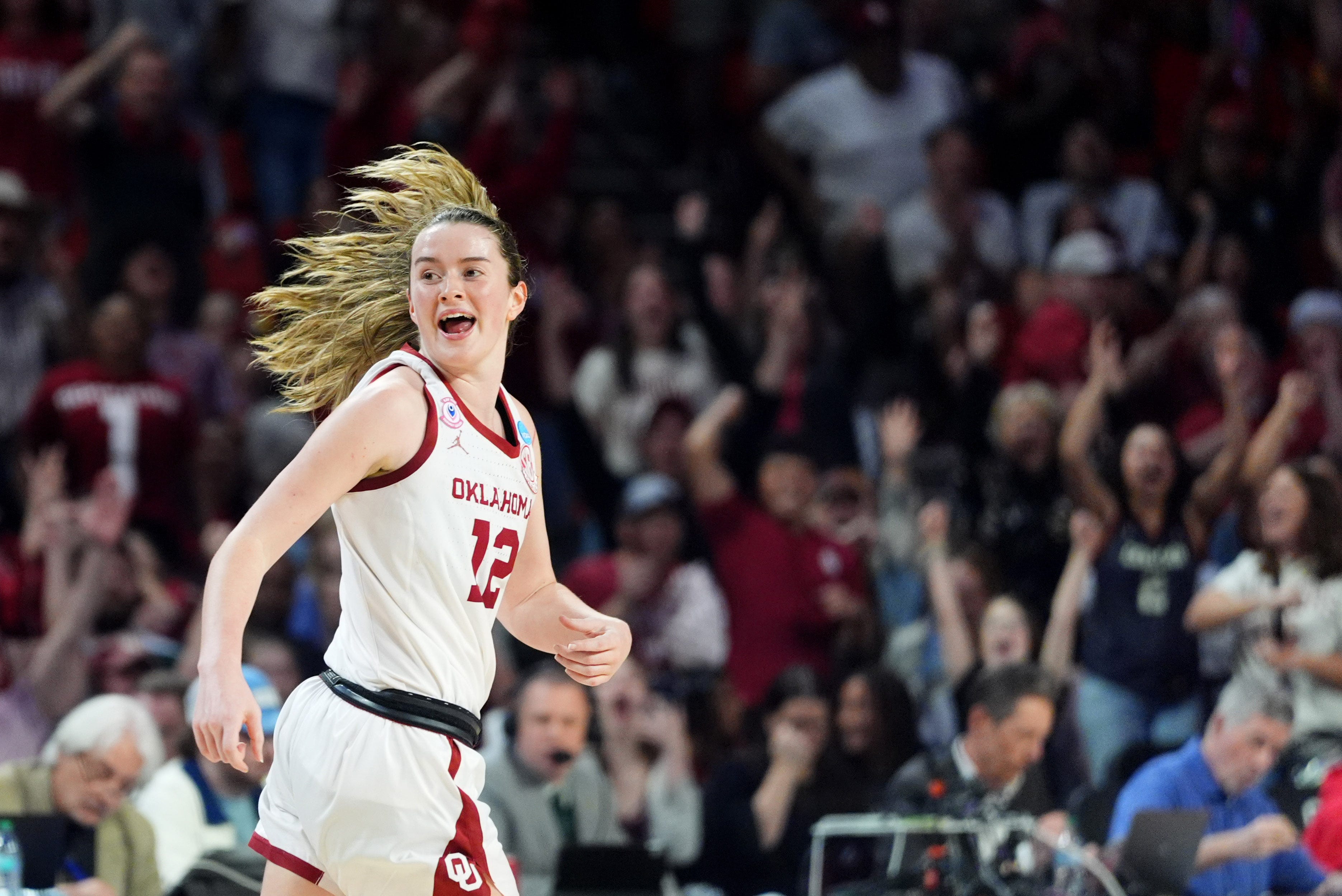 Oklahoma's Payton Verhulst (12) celebrates a 3-point basketduring a second-round game in the NCAA women's basketball tournament between the Oklahoma Sooners and Michigan State Spartans at Lloyd Noble Center in Norman, Okla., Sunday March 22, 2026.