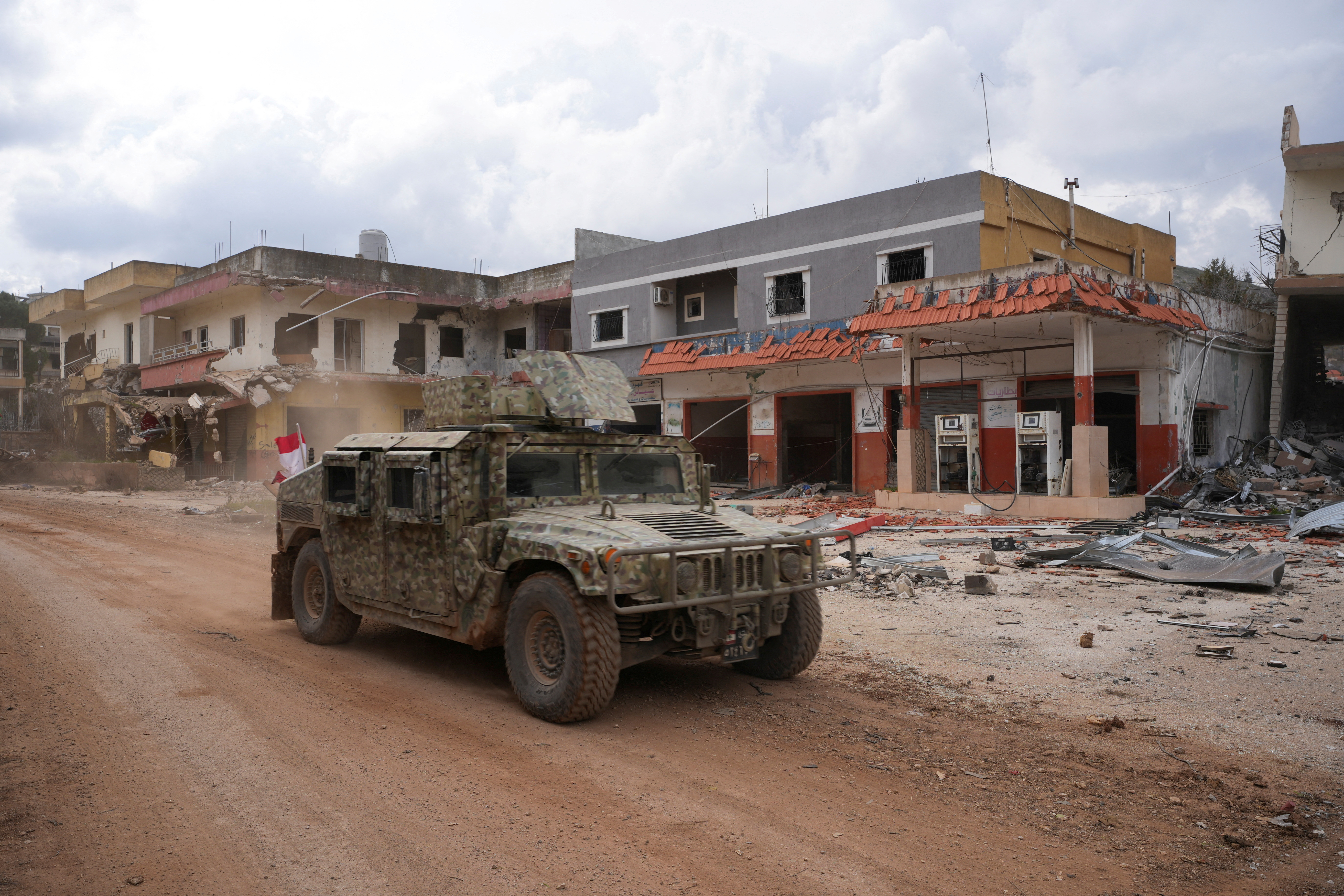 FILE PHOTO: A Lebanese military vehicle drives, after Israeli troops withdrew from most of south Lebanon, in Mays al-Jabal, near the border with Israel, southern Lebanon, February 19, 2025. REUTERS/Mohammed Yassin/File Photo