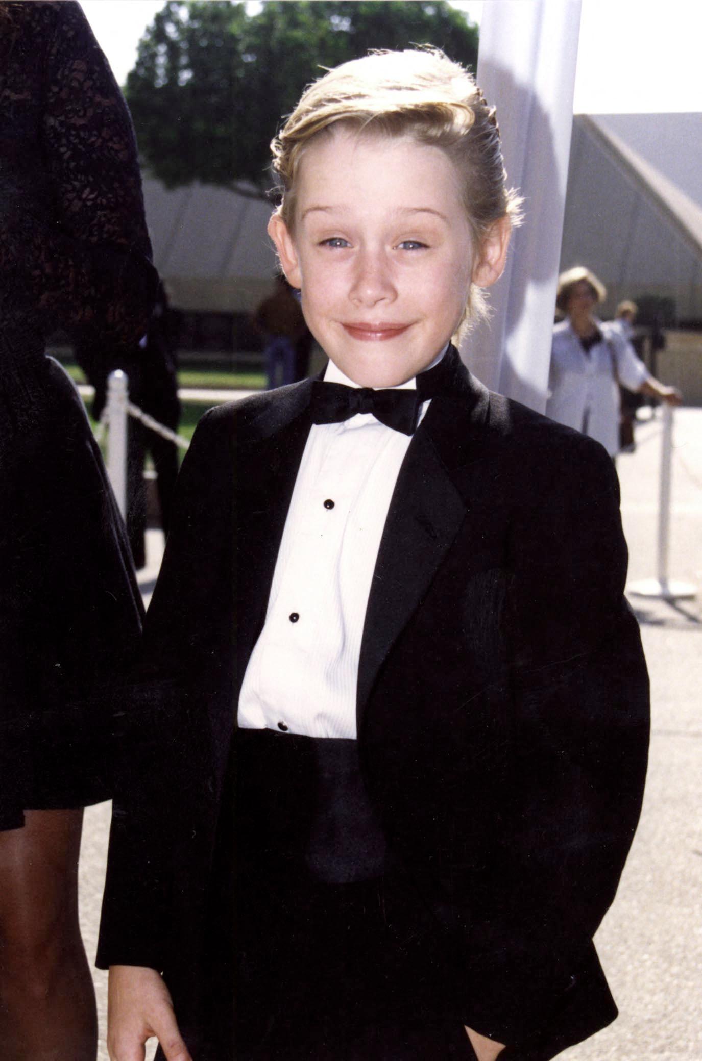 Macaulay Culkin in a tux during Home Alone days
