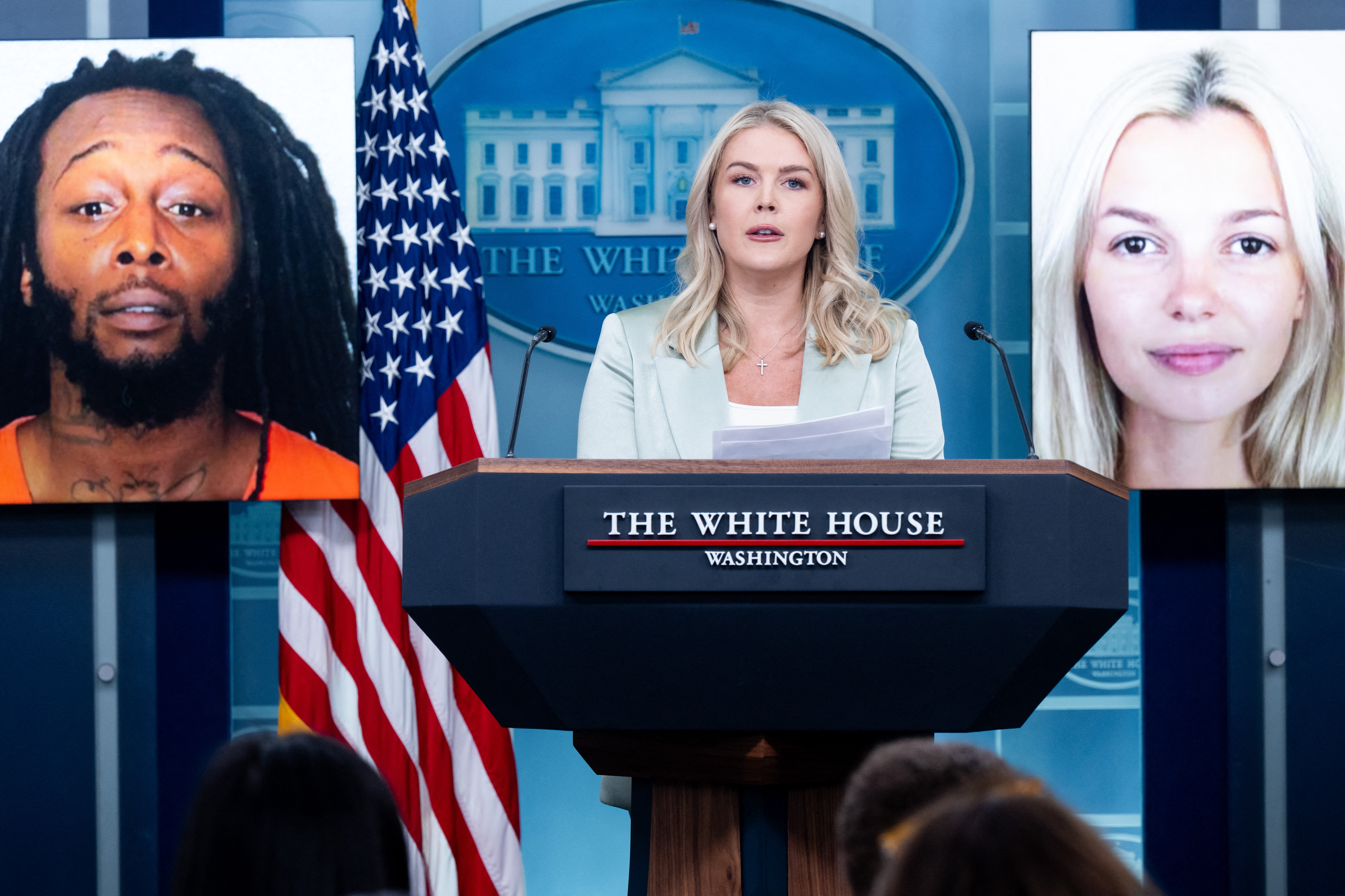 White House Press Secretary Karoline Leavitt speaks alongside a photo of Ukrainian refugee Iryna Zarutska, who was allegedly killed by Decarlos Brown Jr., on a light rail train in Charlotte, North Carolina, during a press briefing in the Brady Press Briefing Room of the White House in Washington, DC, September 9, 2025.