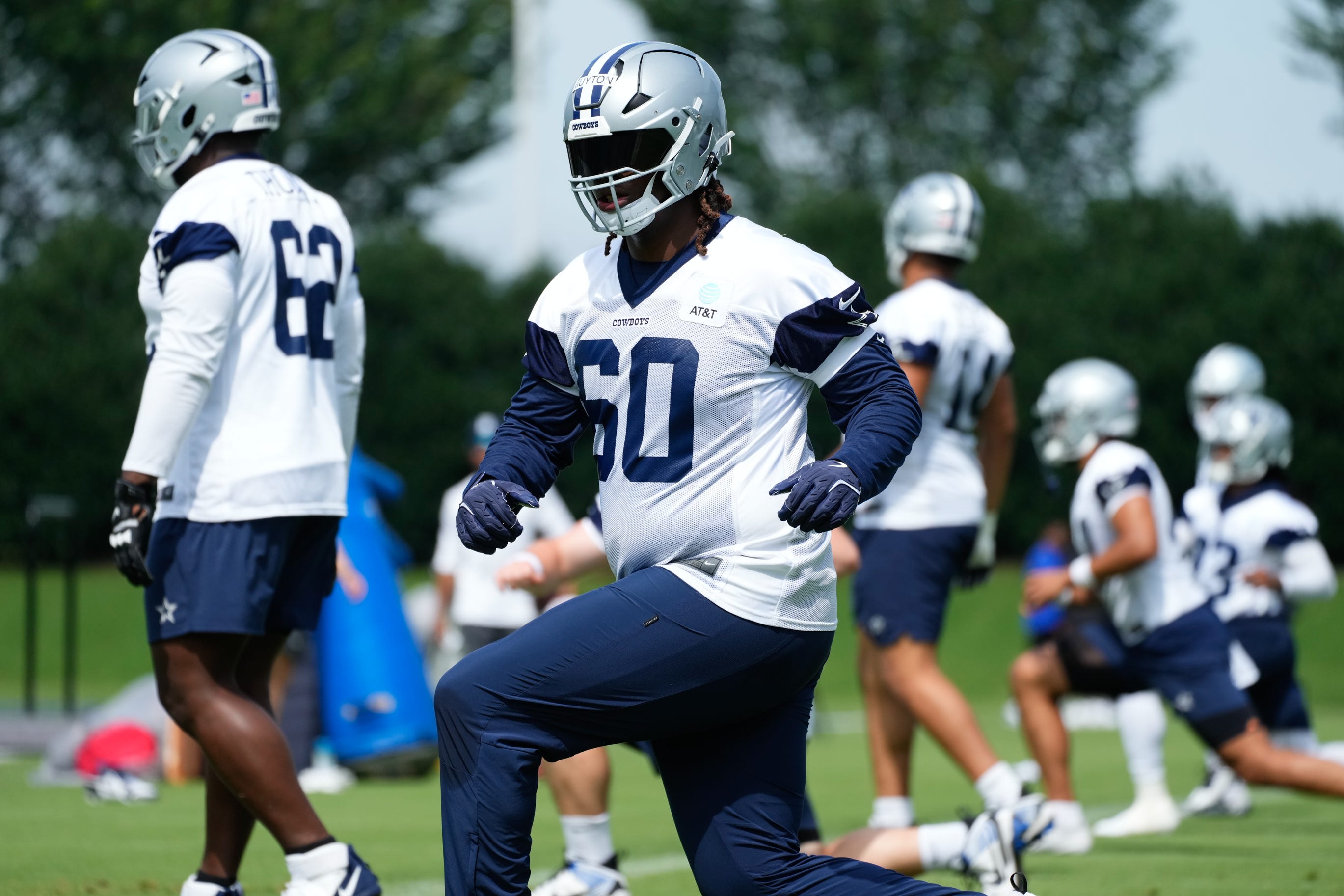 Jun 5, 2024; Frisco, TX, USA; Dallas Cowboys tackle Tyler Guyton (60) goes through a drill during practice at the Ford Center at the Star Training Facility in Frisco, Texas. Mandatory Credit: Chris Jones-USA TODAY Sports
