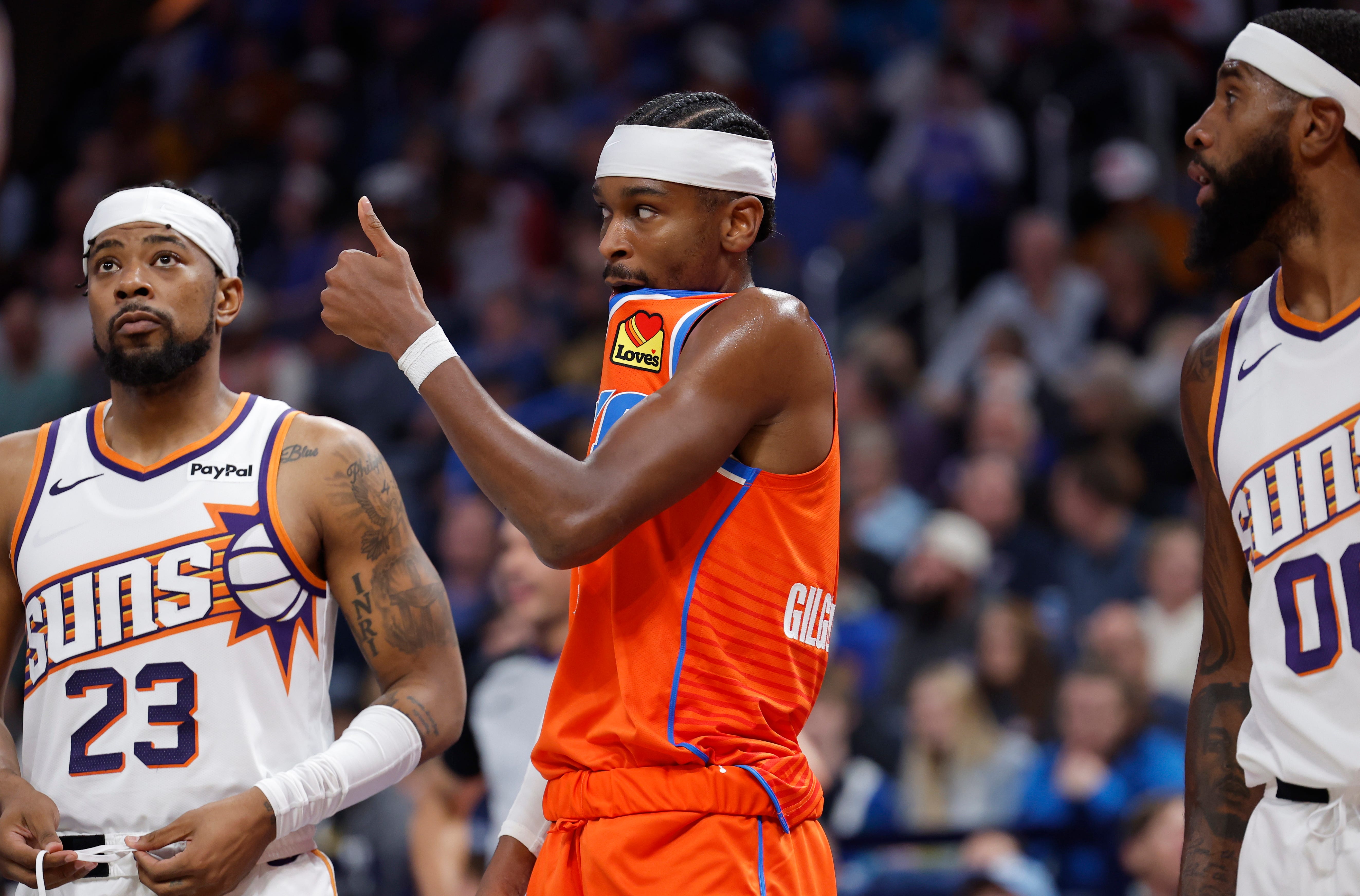 Nov 28, 2025; Oklahoma City, Oklahoma, USA; Oklahoma City Thunder guard Shai Gilgeous-Alexander (2) gives a thumbs up to his team during the second half against the Phoenix Suns at Paycom Center. Mandatory Credit: Alonzo Adams-Imagn Images