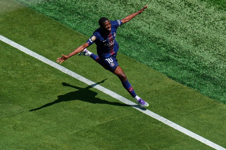 Paris Saint-Germain's Ousmane Dembele (10) celebrates after scoring during the Club World Cup semifinal soccer match between PSG and Real Madrid in East Rutherford, N.J., Wednesday, July 9, 2025. (AP Photo/Pamela Smith)