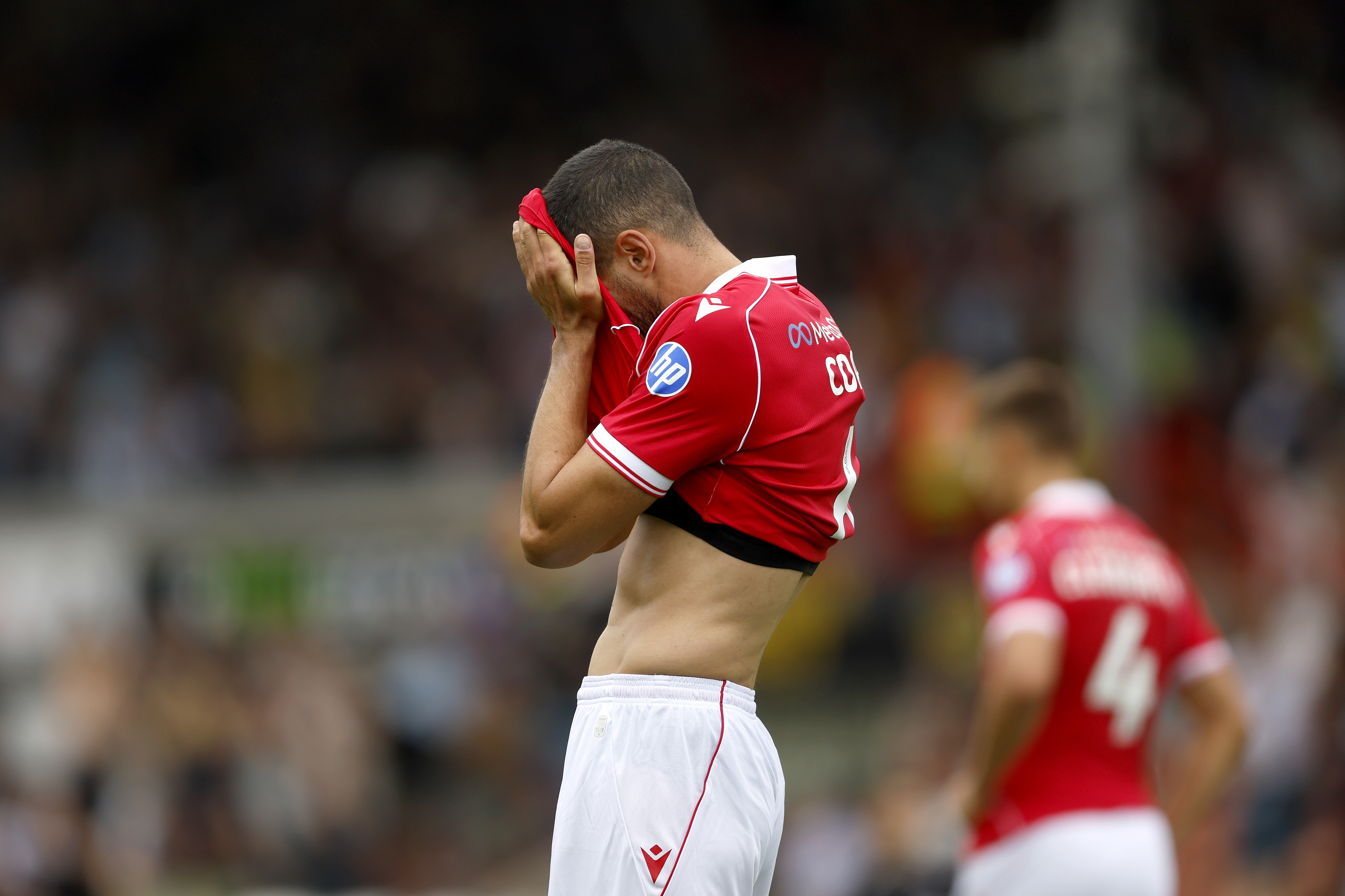 WREXHAM, WALES - AUGUST 16: Connor Coady of Wrexham AFC reacts to the home defeat 2-3 as he covers his face after the final whistle in the Sky Bet Championship match between Wrexham AFC and West Bromwich Albion at Racecourse Ground on August 16, 2025 in Wrexham, United Kingdom. (Photo by Adam Fradgley/West Bromwich Albion FC via Getty Images)