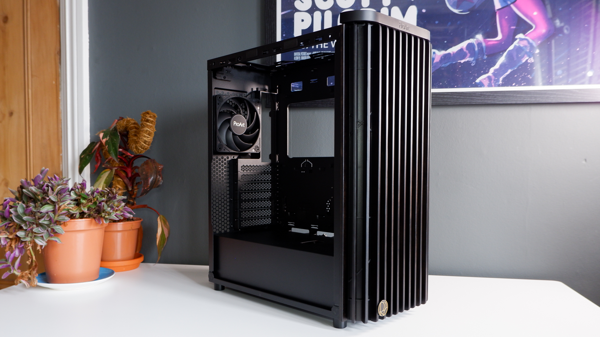 A gaming PC in the process of being built, using Radeon and Ryzen components and an Asus Pro Art PA401 PC case.