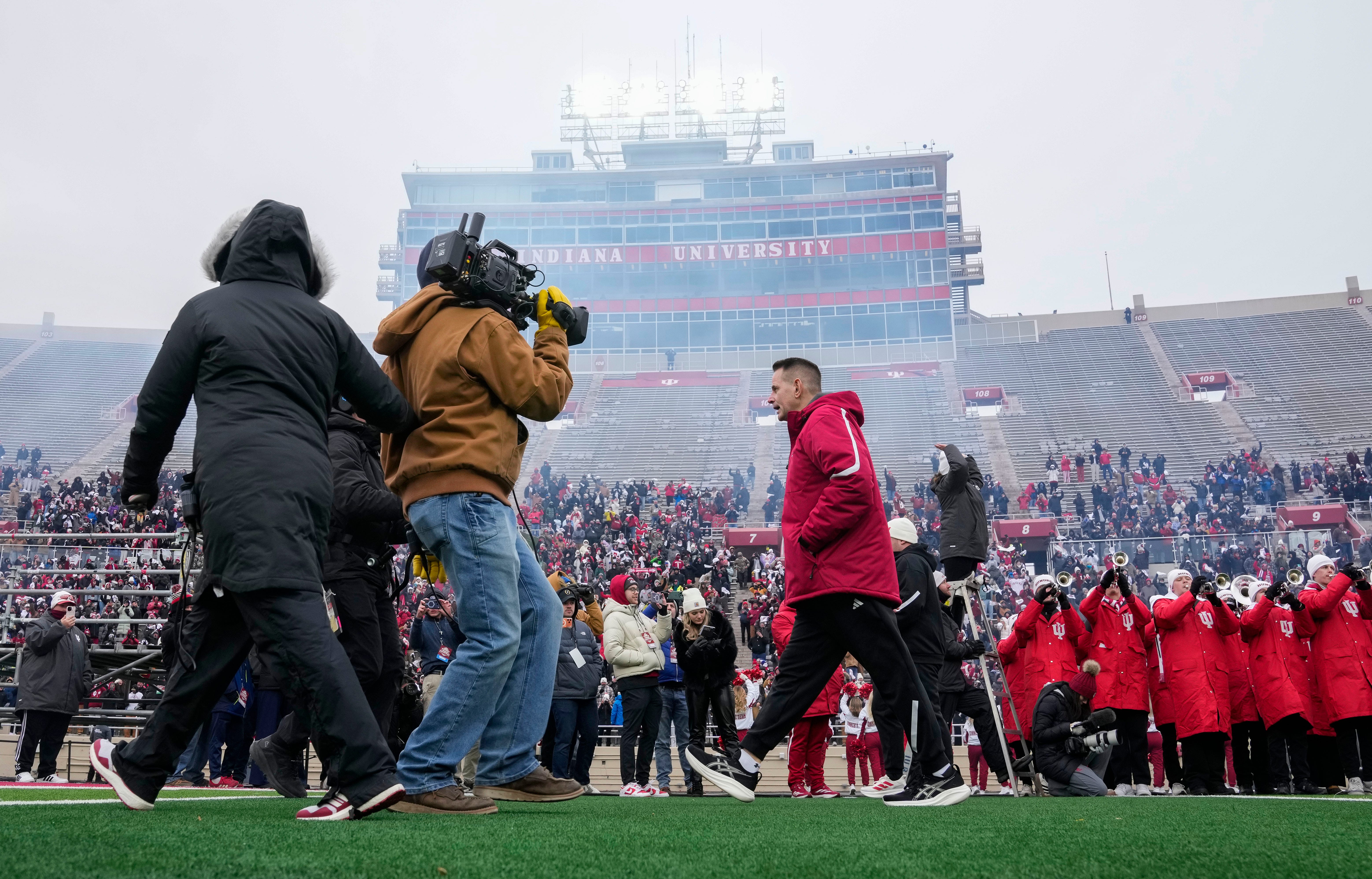 Indiana Hoosiers head coach Curt Cignetti walks onto the field Saturday, Jan. 24, 2026, during the Indiana Football College Football Playoff National Championship celebration and parade at Memorial Stadium in Bloomington.