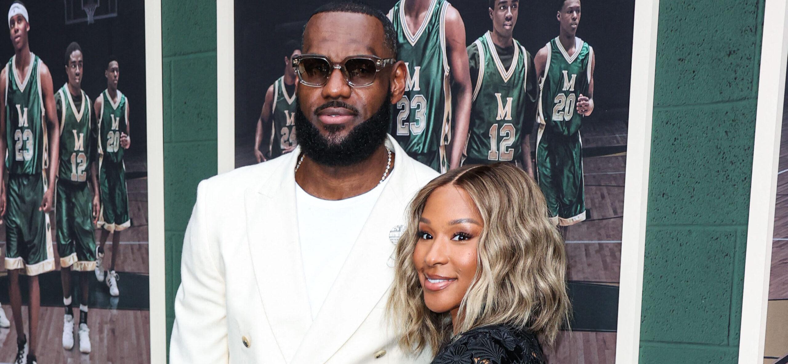 LeBron and Savannah James posing on the red carpet.
