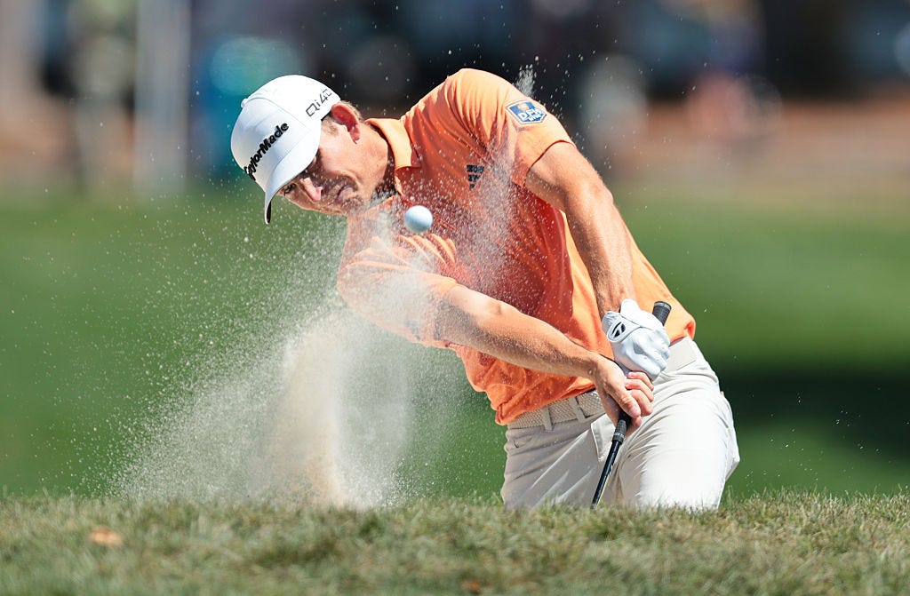 Jacob Bridgeman hits out of a bunker on the fourth hole of the Innisbrook Resort Copperhead Course during the third round of the Valspar Championship on March 21 in Palm Harbor,