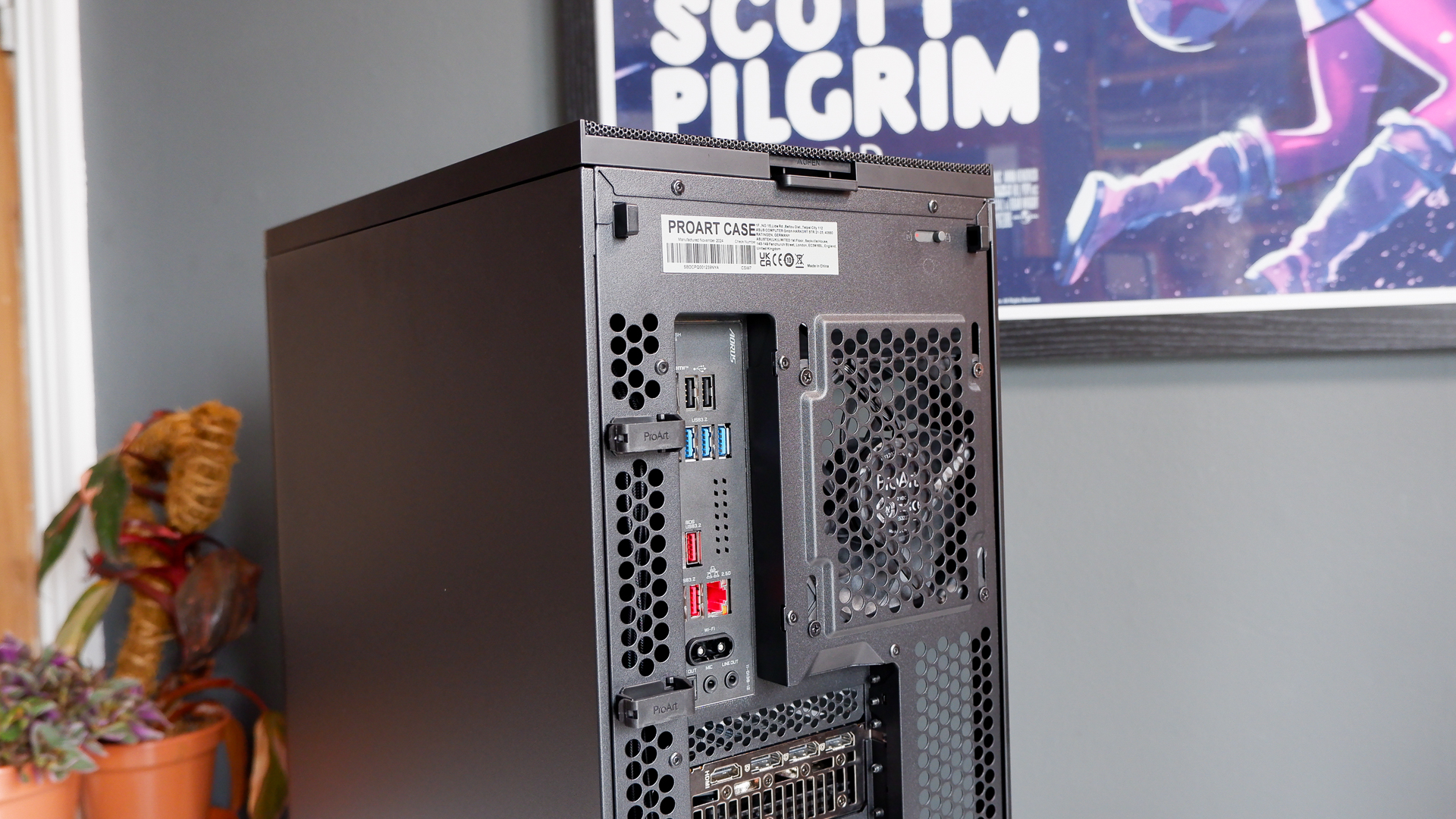 A gaming PC in the process of being built, using Radeon and Ryzen components and an Asus Pro Art PA401 PC case.