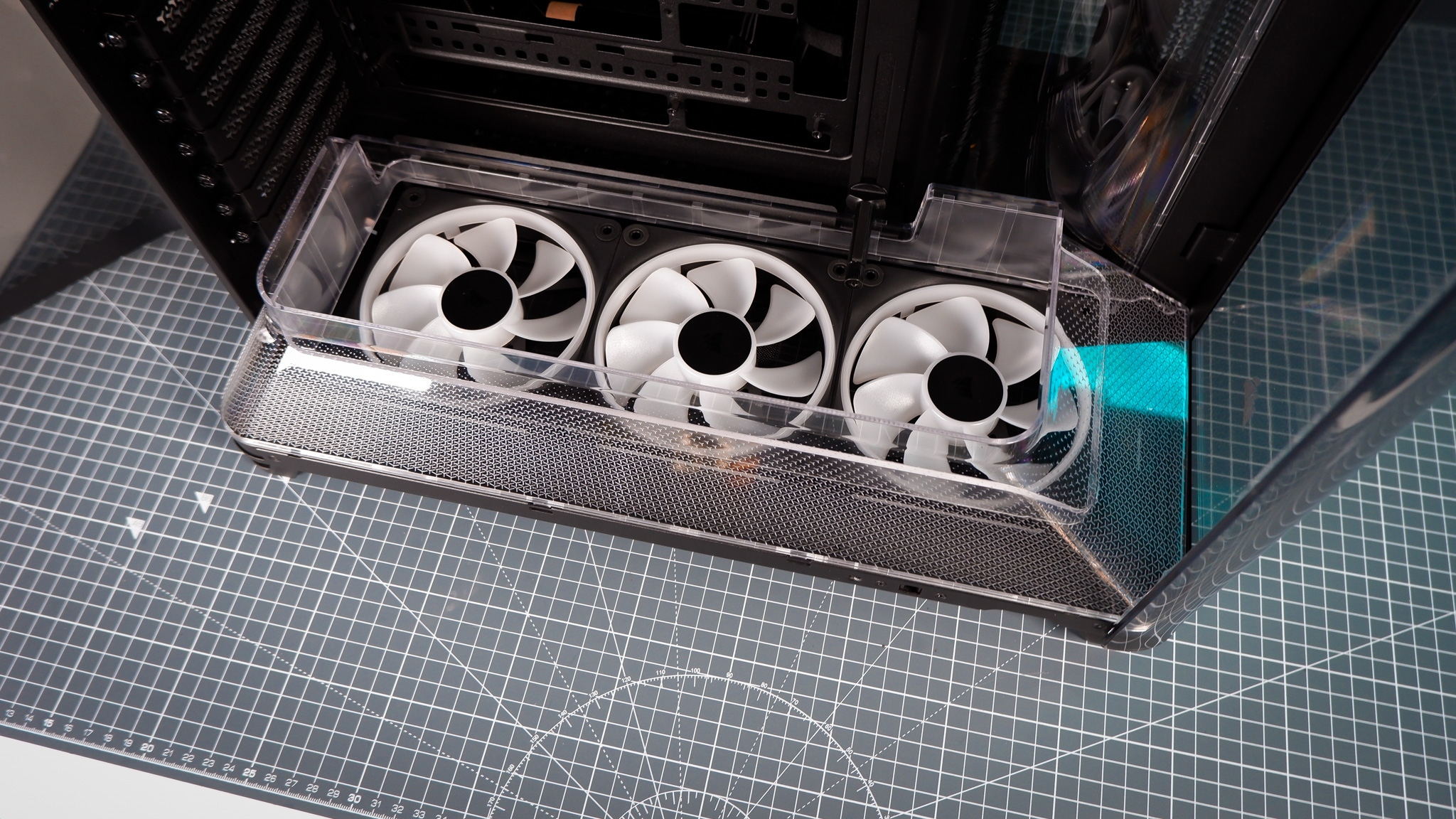 A Corsair Air 5400 PC case on a desk with various parts installed.