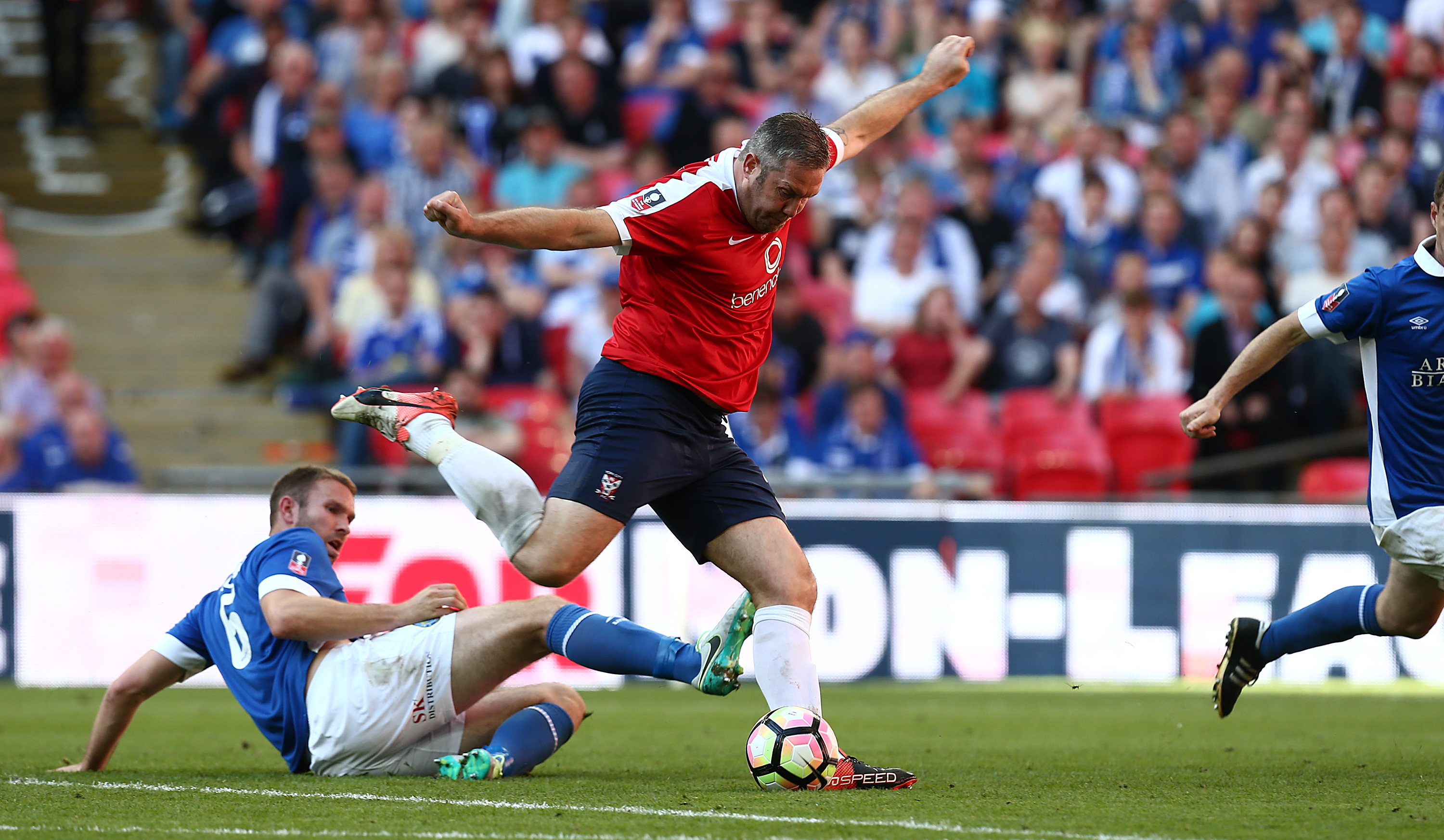 LONDON, ENGLAND - MAY 21: Jon Parkin of York City prepares to shoot for goal to set up his sides third goal scored by Aiden Connolly during The Buildbase FA Trophy Final between York City and Macclesfield Town at Wembley Stadium on May 21, 2017 in London, England. (Photo by Pete Norton/Getty Images)