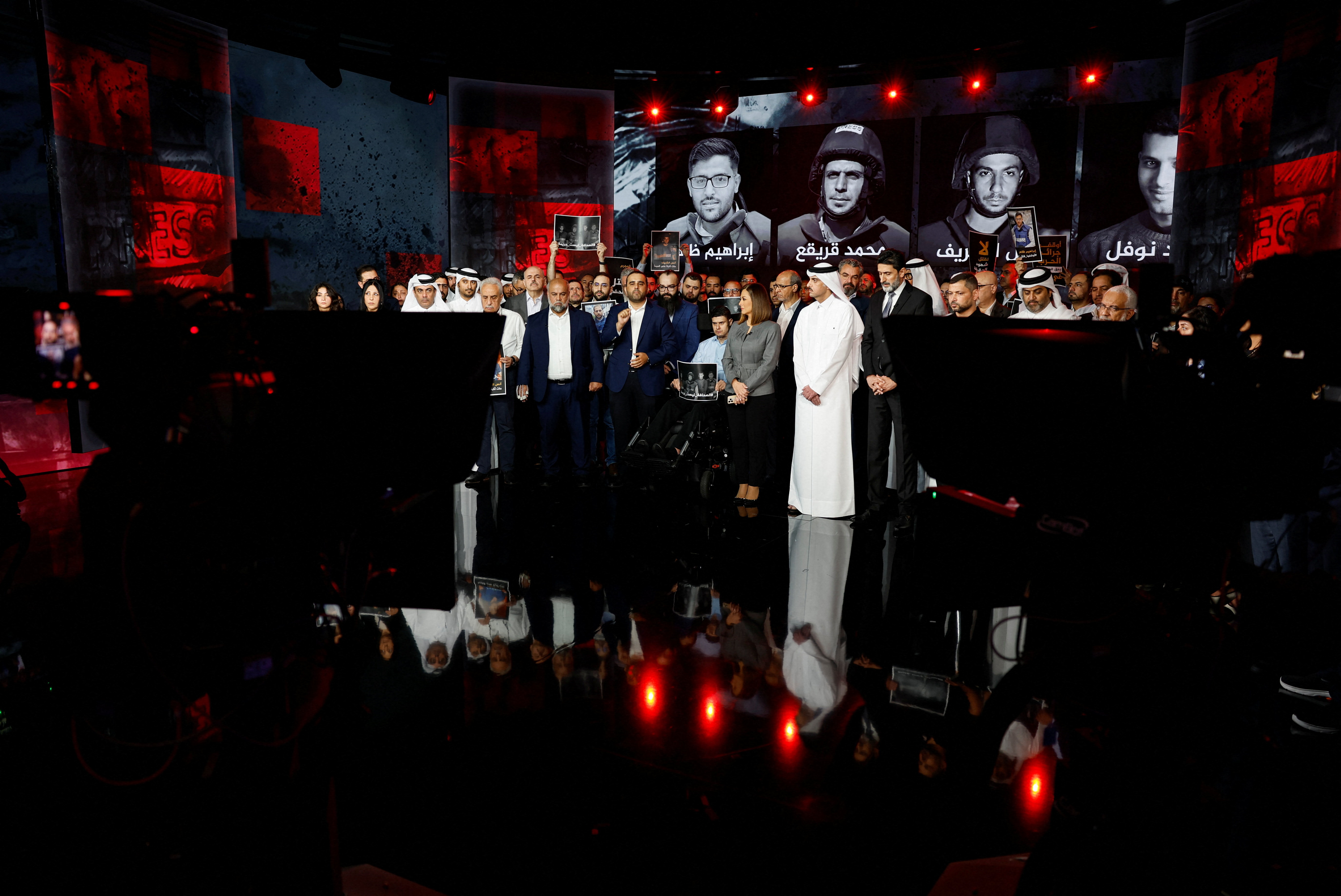 Al Jazeera staff members gather at the network&rsquo;s studios, to remember their colleagues Anas Al Sharif, Mohammed Qreiqeh, Ibrahim Zaher, Mohammed Noufal and another colleague, who were killed in Gaza City by an Israeli strike, in Doha, Qatar, August 11, 2025. REUTERS/Ibraheem Abu Mustafa