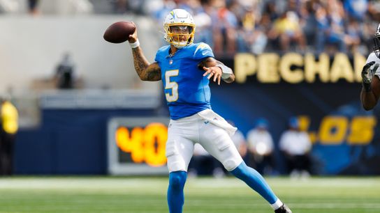 Trey Lance #5 of the Los Angeles Chargers throws on the run during the second half against the New Orleans Saints at SoFi Stadium on August 10, 2025 in Inglewood, California. 