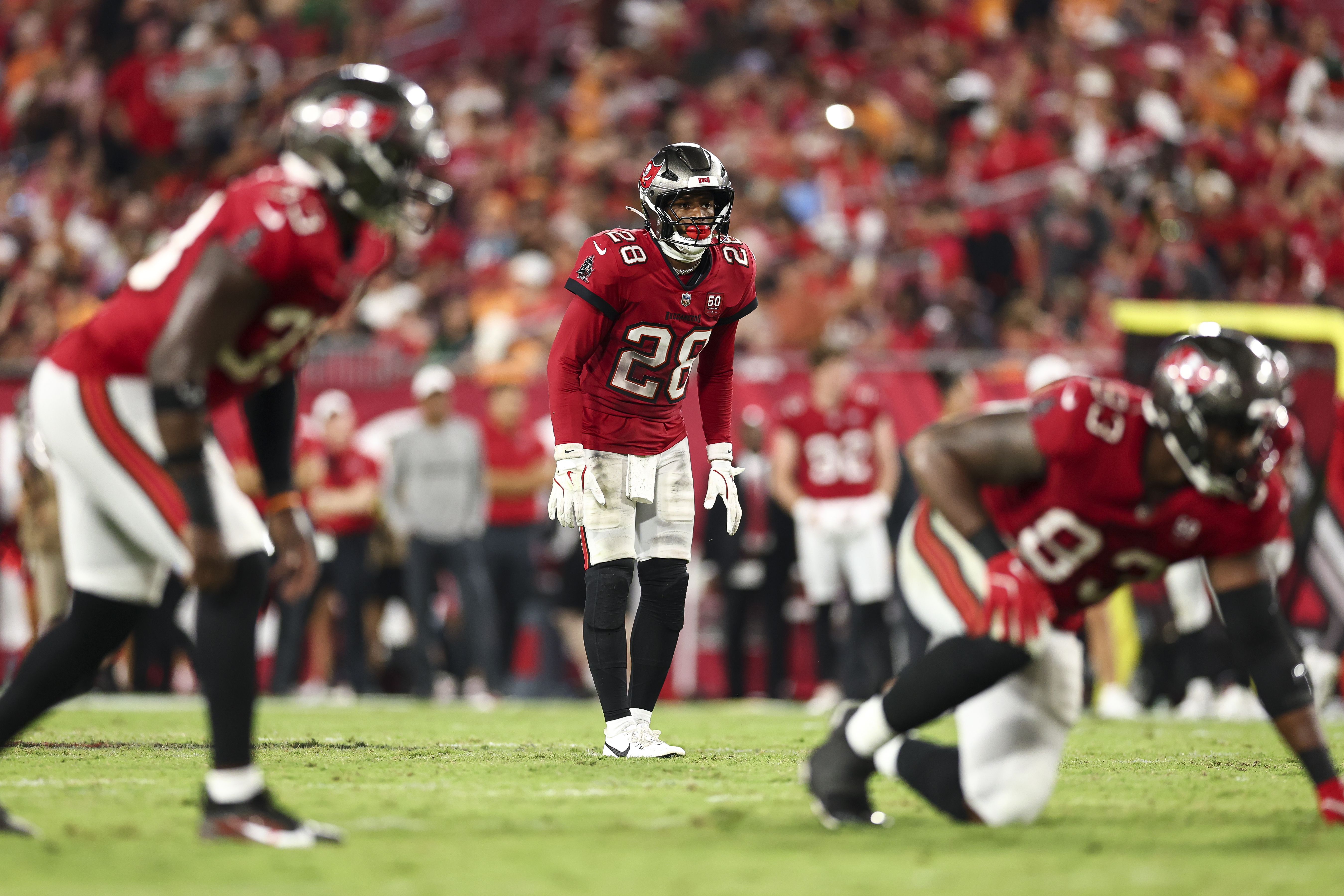 TAMPA, FLORIDA - AUGUST 9: Shilo Sanders #28 of the Tampa Bay Buccaneers lines up before a play during an NFL preseason football game against the Tennessee Titans at Raymond James Stadium on August 9, 2025 in Tampa, Florida. (Photo by Kevin Sabitus/Getty Images)