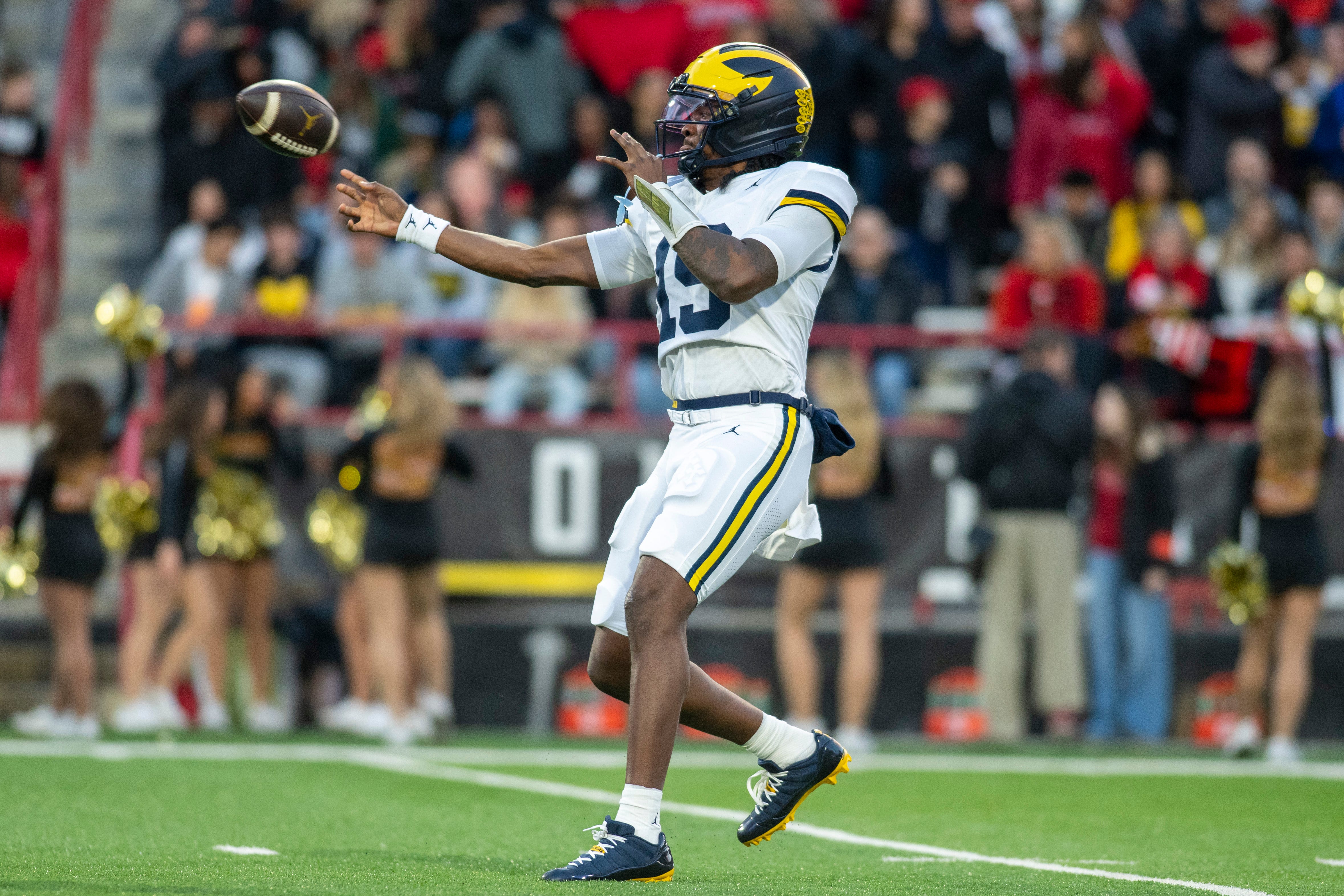 Michigan Wolverines quarterback Bryce Underwood (19) throws off his back foot during the first half against the Maryland Terrapins at SECU Stadium in College Park, Maryland on Saturday, Nov. 22, 2025.