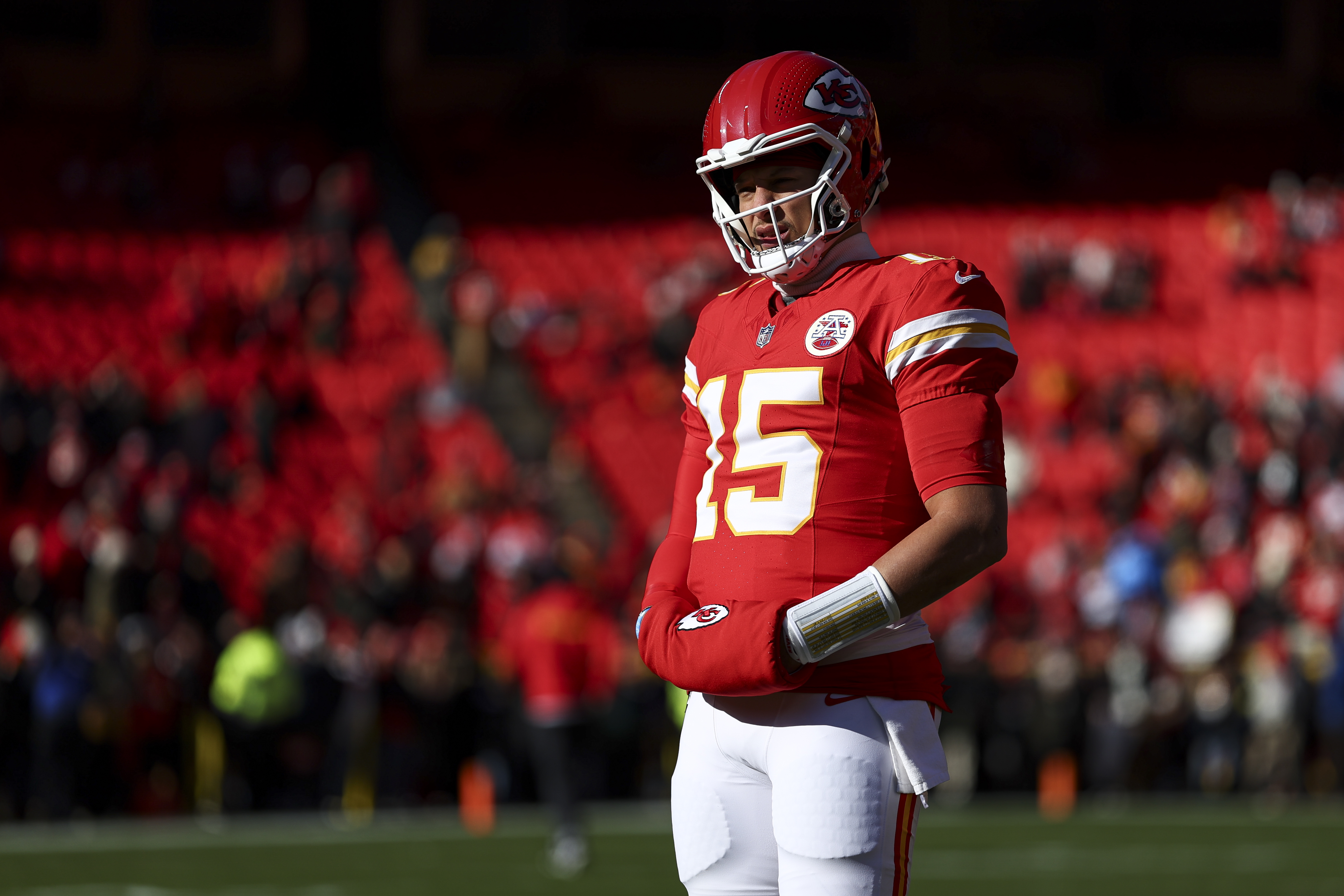 KANSAS CITY, MISSOURI - DECEMBER 14: Patrick Mahomes #15 of the Kansas City Chiefs warms up prior to the NFL football game against the Los Angeles Chargers at GEHA Field at Arrowhead Stadium on December 14, 2025 in Kansas City, Missouri. (Photo by Kevin Sabitus/Getty Images)