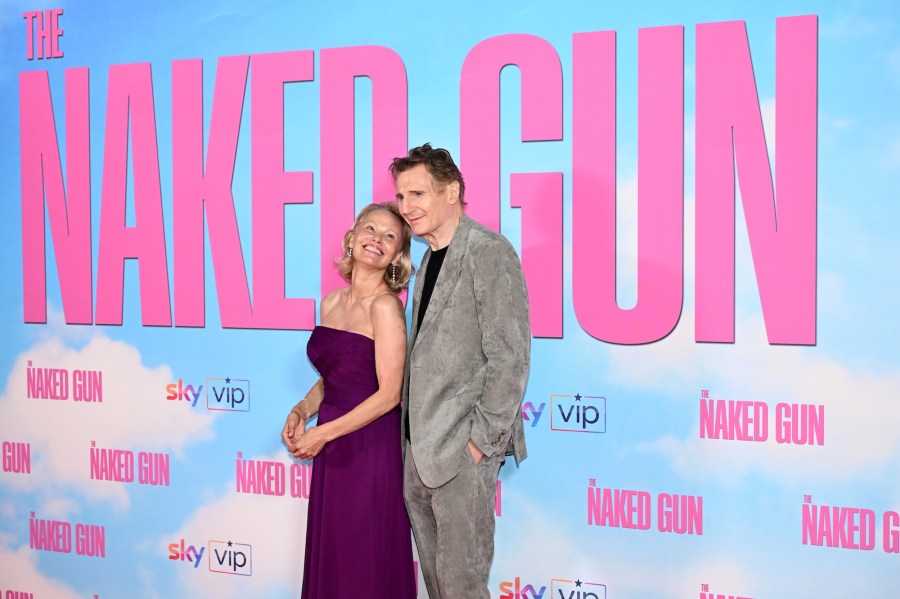 Pamela Anderson Kisses Naked Gun Costar Liam Neeson at UK Premiere Smile