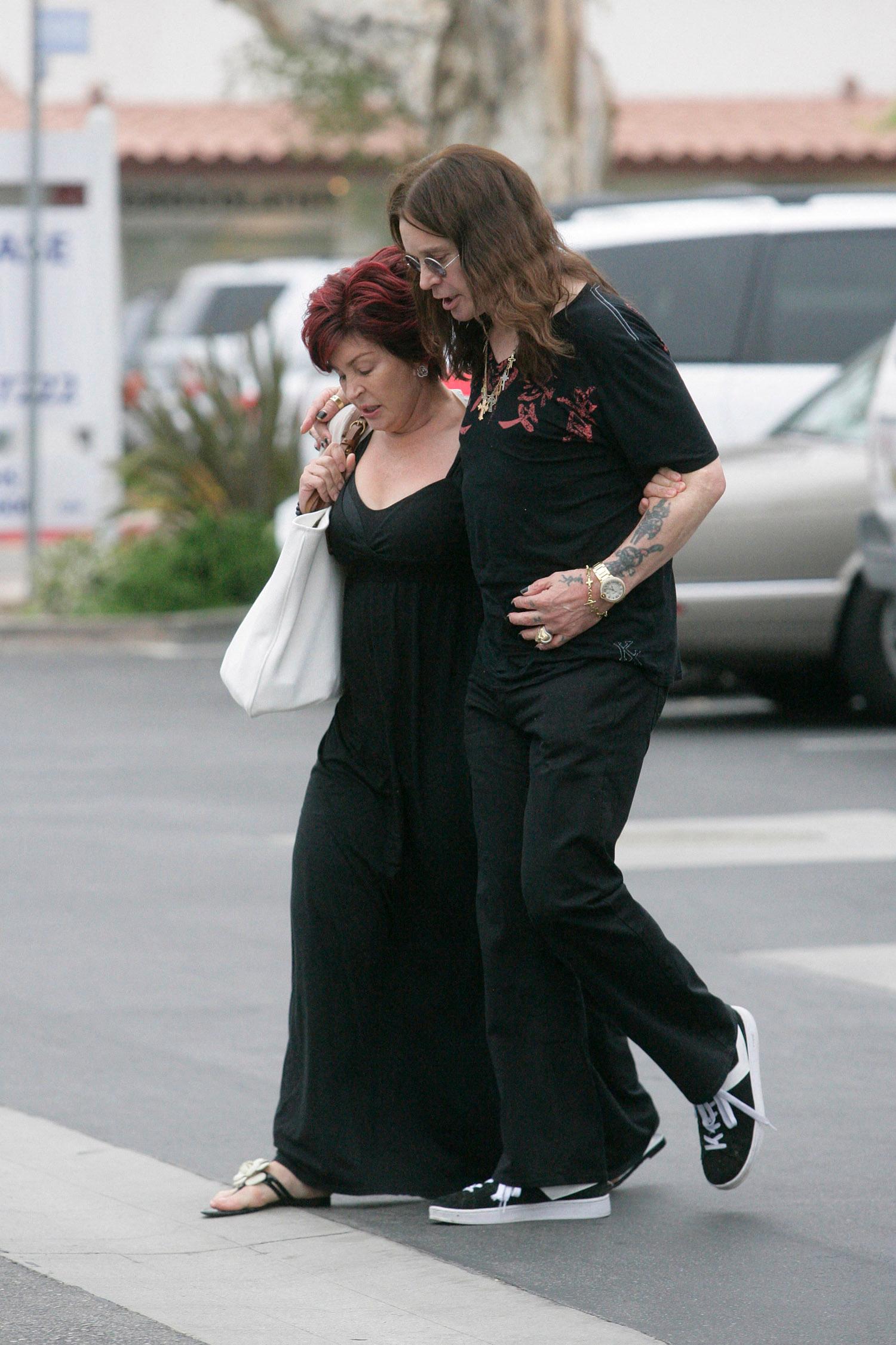 Ozzy Osbourne and Sharon out walking