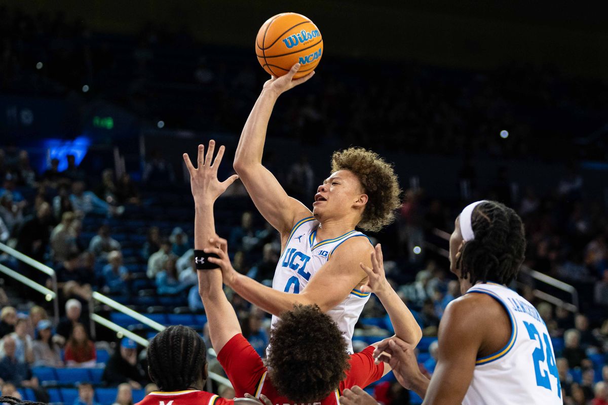 UCLA guard Trent Perry (0) attacks the lane during a Big 10 basketball game against Maryland, Saturday , January 10th, 2025 in Los Angeles, California