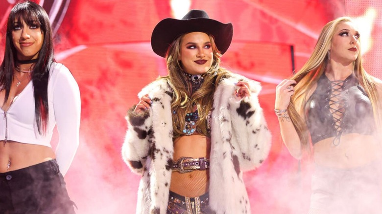 Fallon Henley heads down to the ring with Fatal Influence stablemates Jacy Jayne and Lainey Reid before a match on "WWE NXT."