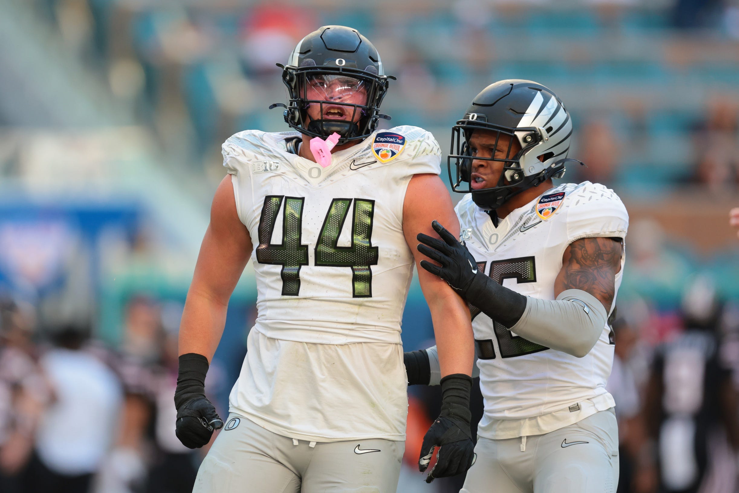 Jan 1, 2026; Miami Gardens, FL, USA; Oregon Ducks linebacker Teitum Tuioti (44) reacts after a sack against the Texas Tech Red Raiders during the second half of the 2025 Orange Bowl and quarterfinal game of the College Football Playoff at Hard Rock Stadium. Mandatory Credit: Sam Navarro-Imagn Images