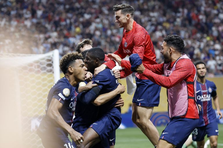 epa12218843 Ousmane Dembele (2L) of PSG celebrates with teammates after scoring the 2-0 goal during the FIFA Club World Cup 2025 match between Paris Saint-Germain and FC Bayern Munich, in Atlanta, Georgia, USA, 05 July 2025. EPA/ERIK S. LESSER