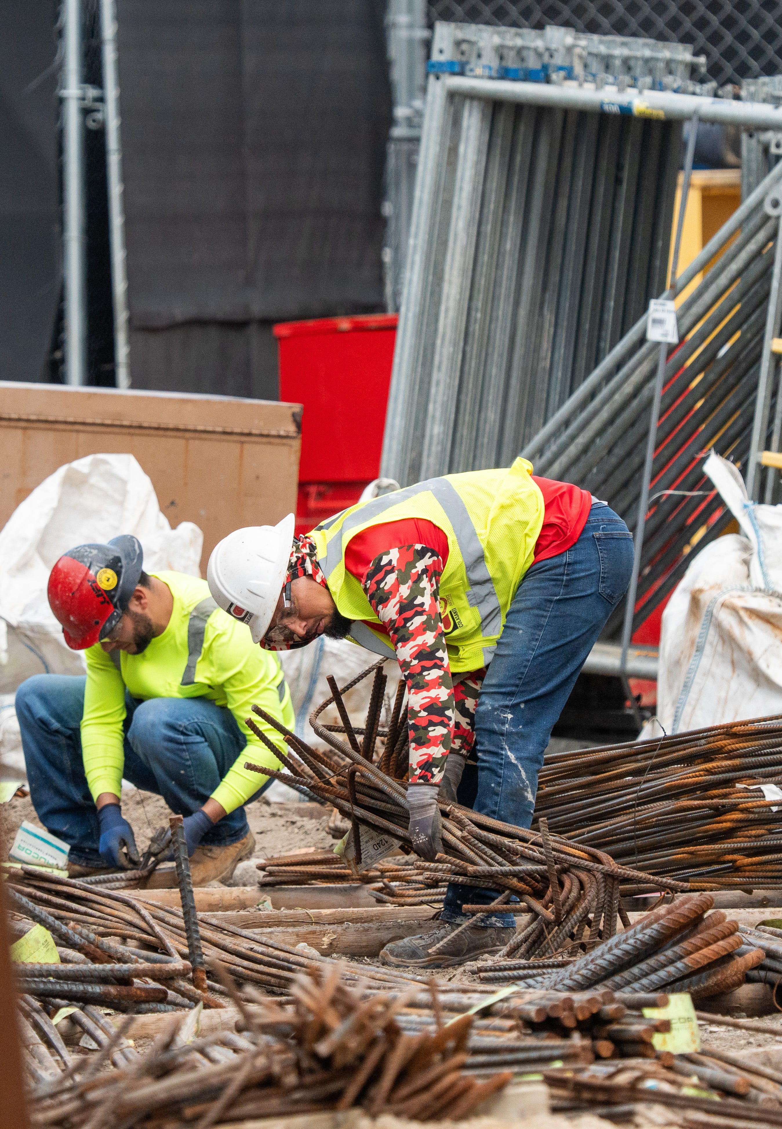 Construction workers gather rebar during the renovations at EverBank Stadium Tuesday December 2, 2025 in Jacksonville, Fla. The construction is slated to finish in time for the Jaguars to play in the renovated stadium for the 2028 season. [Doug Engle/Florida Times-Union]