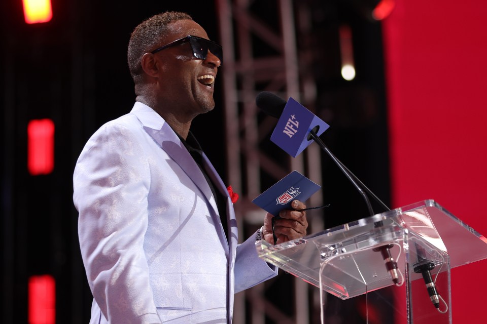 DETROIT, MICHIGAN - APRIL 26: NFL Legend Andre Rison takes the stage during rounds two and three of the 2024 NFL draft at Campus Martius Park on April 26, 2024 in Detroit, Michigan. (Photo by Gregory Shamus/Getty Images)