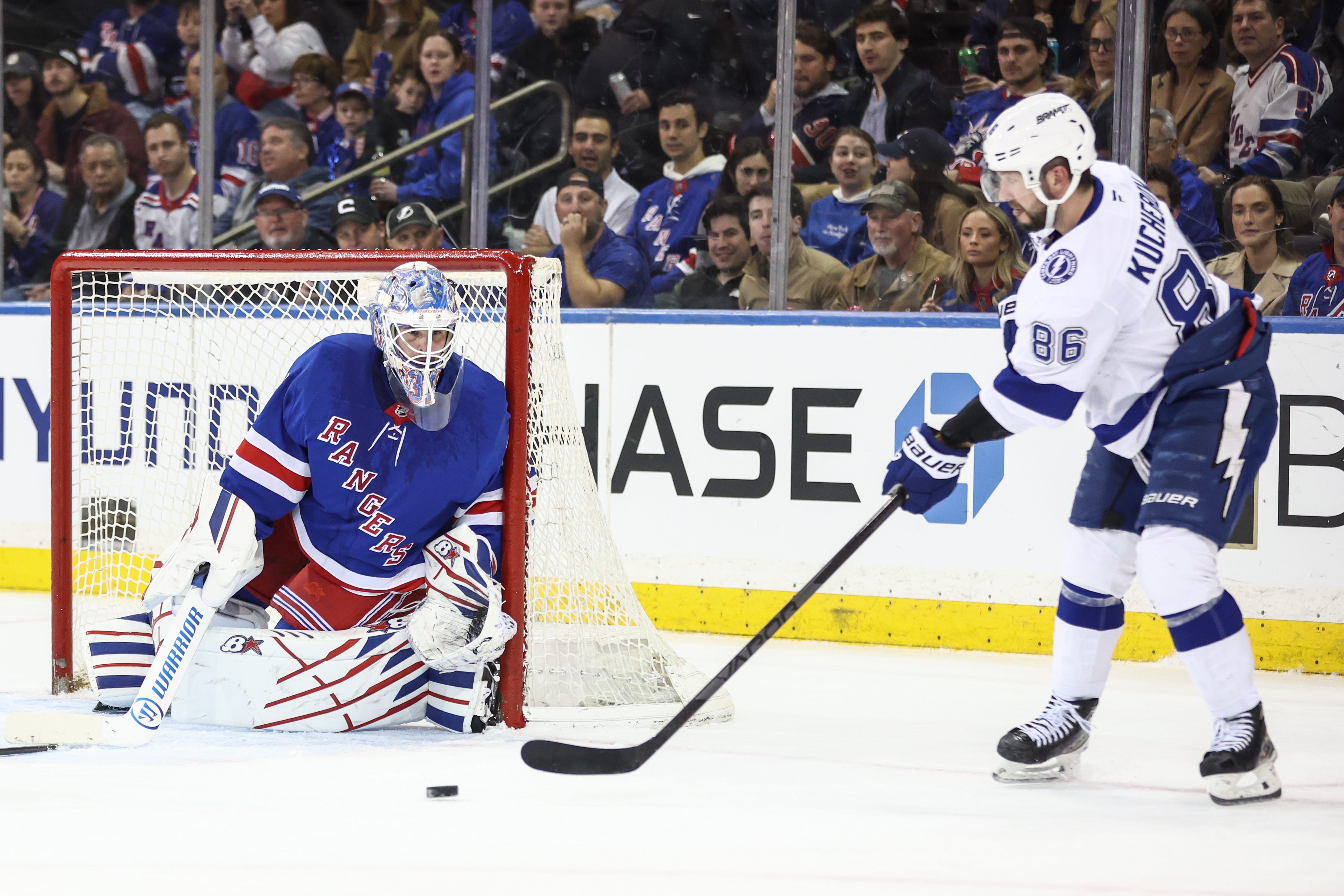Apr 17, 2025; New York, New York, USA; New York Rangers goaltender Igor Shesterkin (31) makes a save on a shot on goal attempt by Tampa Bay Lightning right wing Nikita Kucherov (86) in the second period at Madison Square Garden. Mandatory Credit: Wendell Cruz-Imagn Images