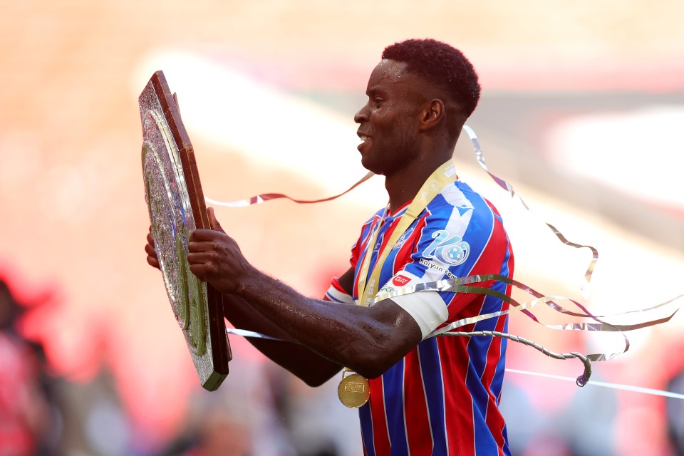 LONDON, ENGLAND - AUGUST 10: Marc Guehi of Crystal Palace celebrates with the FA Community Shield after his team's victory in the 2025 FA Community Shield match between Crystal Palace and Liverpool at Wembley Stadium on August 10, 2025 in London, England. (Photo by Julian Finney/Getty Images)