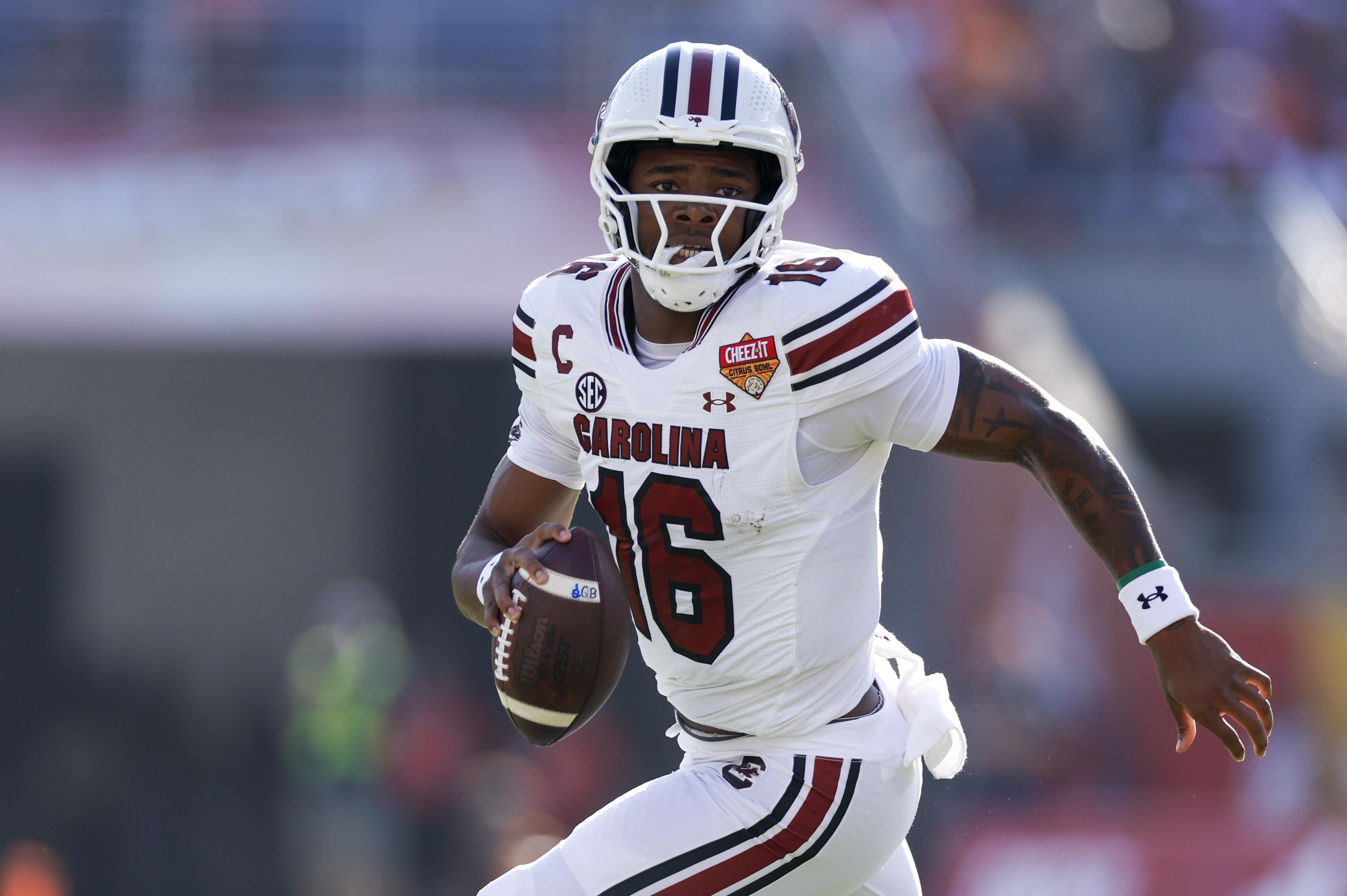 ORLANDO, FL - DECEMBER 31: South Carolina Gamecocks quarterback LaNorris Sellers (16) runs with the ball during the game between the South Carolina Gamecocks and the Illinois Fighting Illini on December 31, 2024 at Camping World Stadium in Orlando, Fl. (Photo by David Rosenblum/Icon Sportswire via Getty Images)