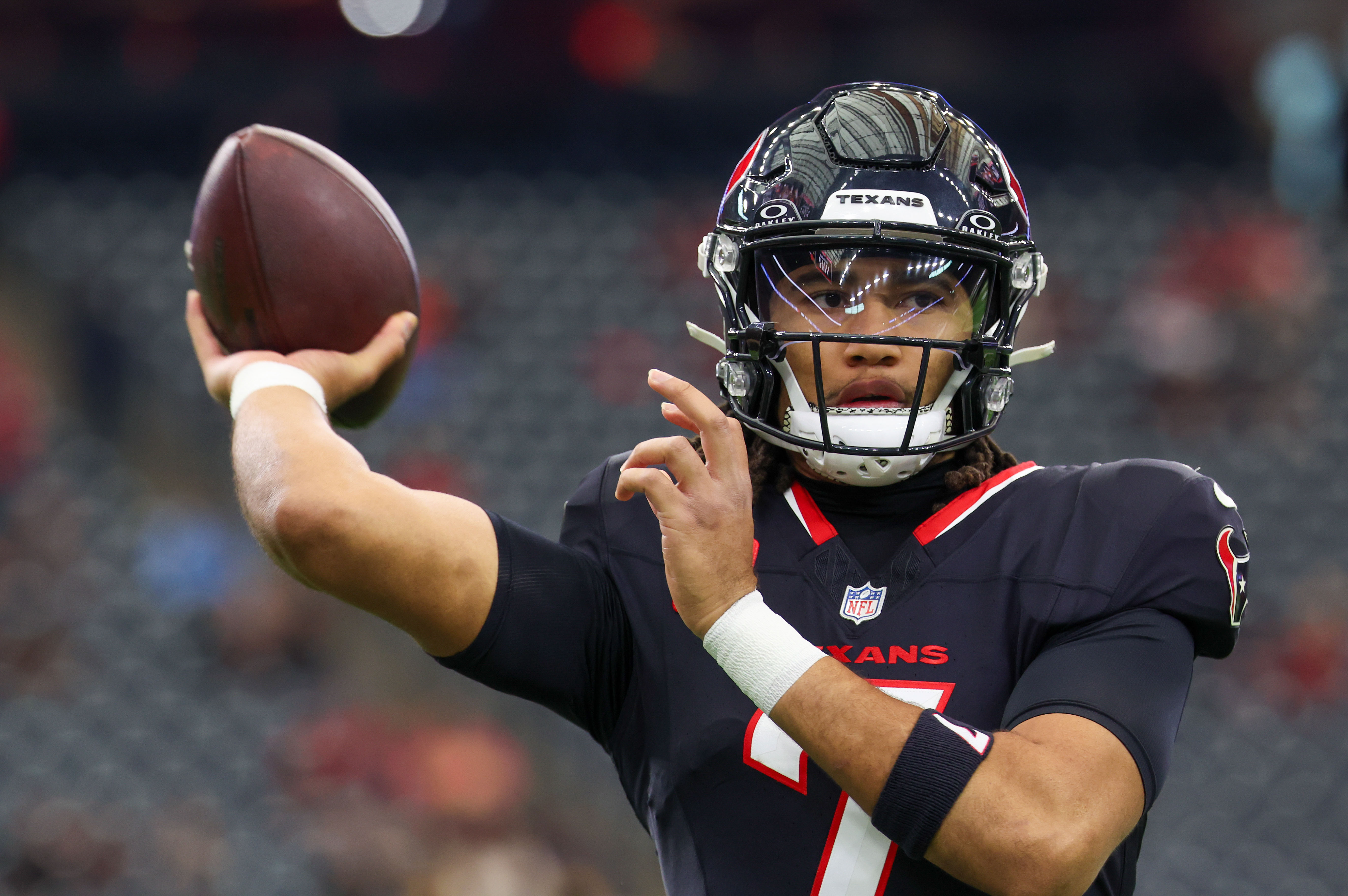Dec 14, 2025; Houston, Texas, USA; Houston Texans quarterback C.J. Stroud (7) warms up before playing against the Arizona Cardinals at NRG Stadium. Mandatory Credit: Thomas Shea-Imagn Images