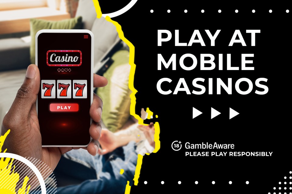 Hand holding phone displaying a mobile casino slot game with 777 showing. Play at mobile casinos. Please play responsibly.