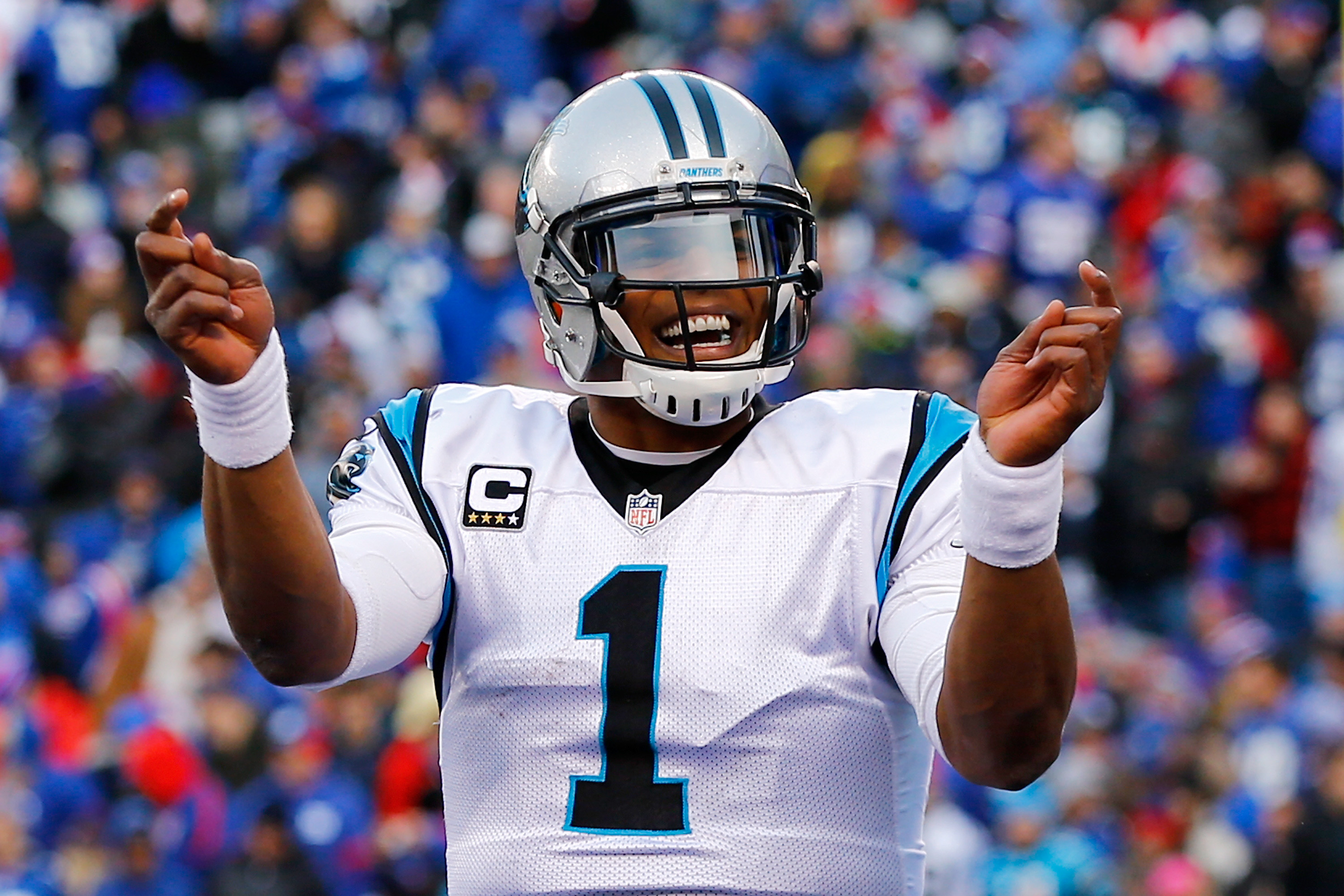 EAST RUTHERFORD, NJ - DECEMBER 20: Cam Newton #1 of the Carolina Panthers celebrates a touchdown in the third quarter against the New York Giants during their game at MetLife Stadium on December 20, 2015 in East Rutherford, New Jersey. (Photo by Al Bello/Getty Images)