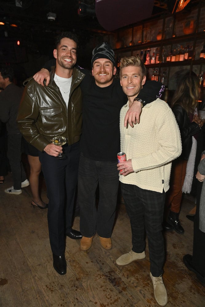 Kyle Cooke posing with "Summer House" cast members.