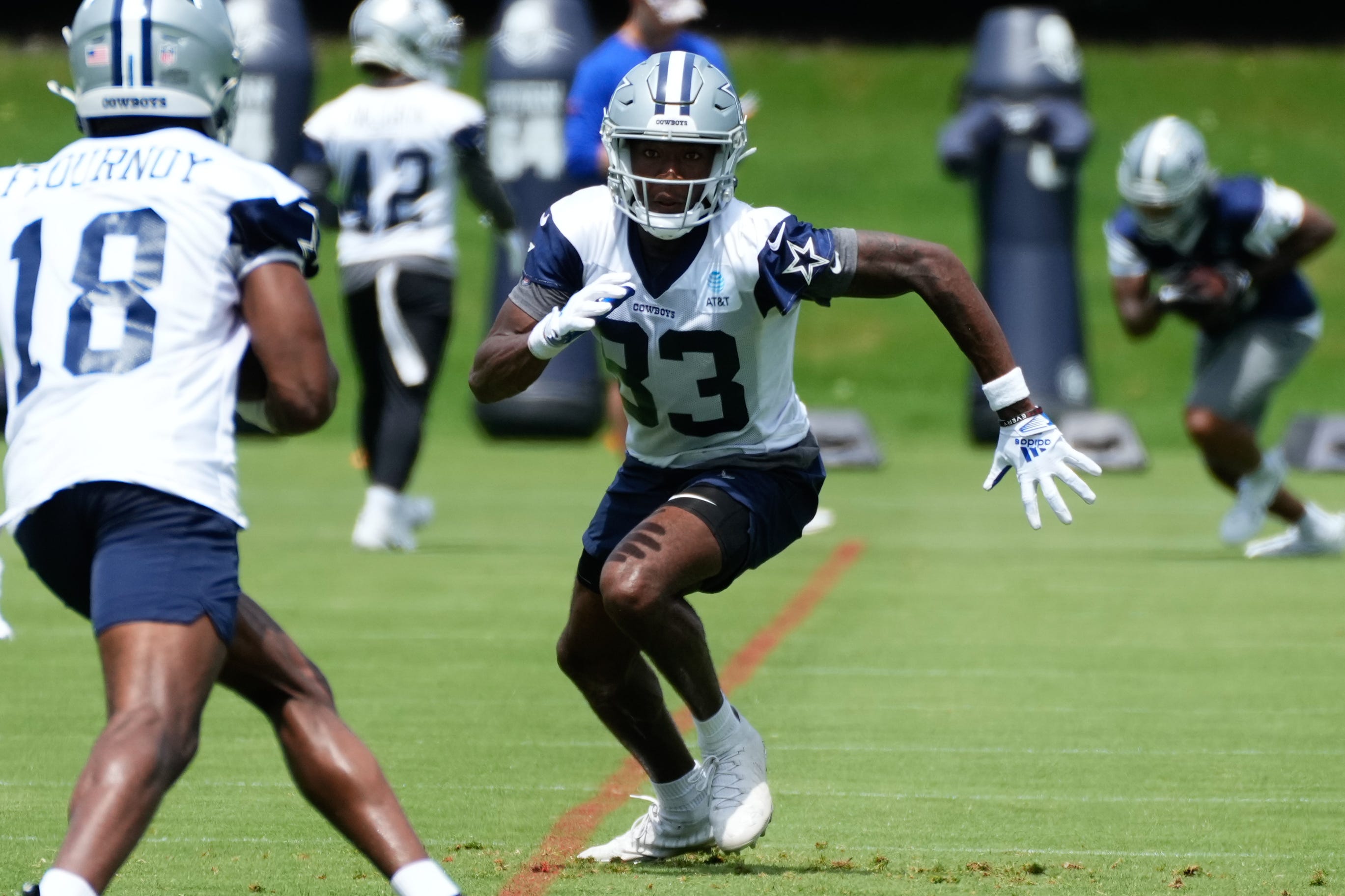 Jun 5, 2024; Frisco, TX, USA; Dallas Cowboys safety Julius Wood (33) goes through a drill during practice at the Ford Center at the Star Training Facility in Frisco, Texas. Mandatory Credit: Chris Jones-USA TODAY Sports