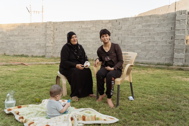 Bothaina and her daughter Farah, born with neurological issues. Families across Fallujah say children like Farah embody the long-term consequences of wartime contamination. Photo by Jaclynn Ashly.