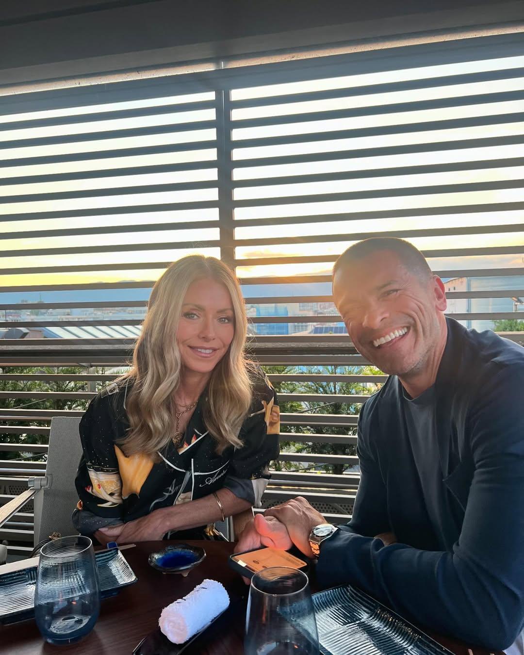 Kelly Ripa and Mark Consuelos at dinner