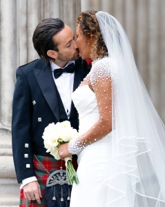Mel-and-Rory-wedding-kiss-GettyImages-2223784577.