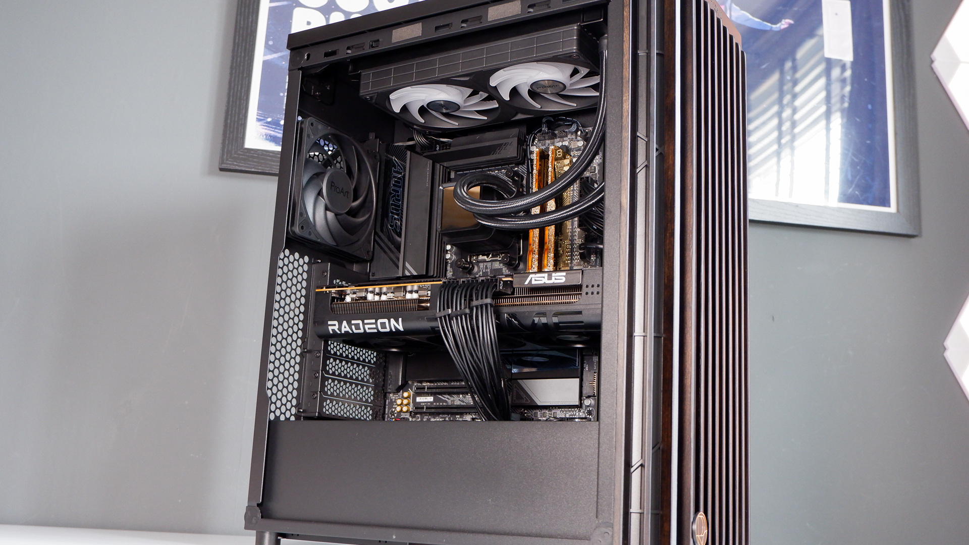 A gaming PC in the process of being built, using Radeon and Ryzen components and an Asus Pro Art PA401 PC case.